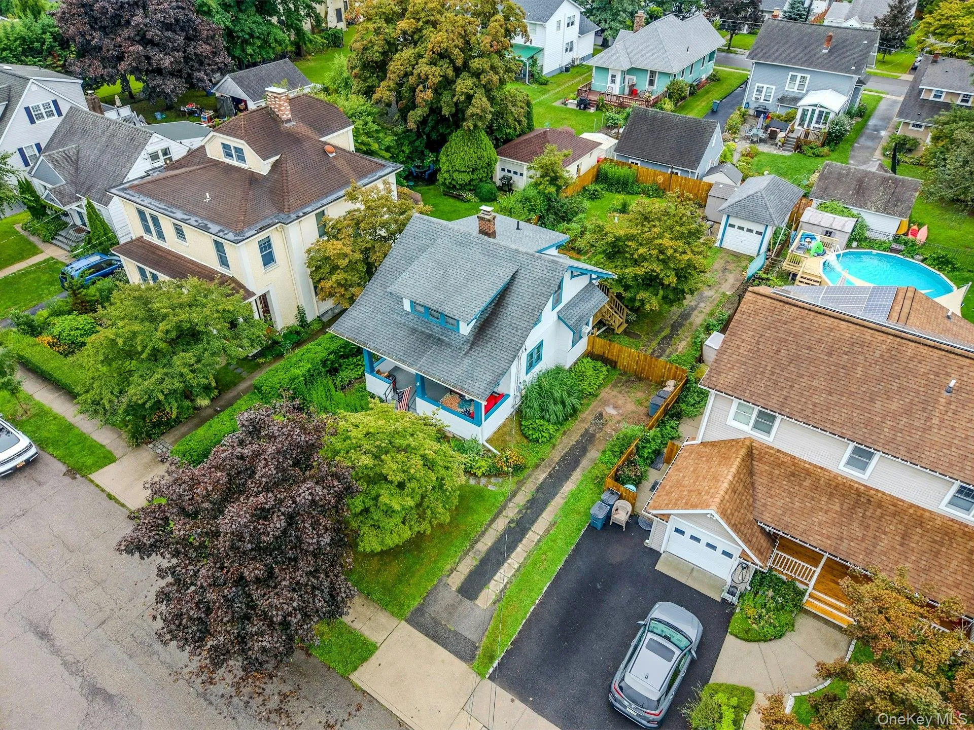 Aerial view showcasing the impressive length of the driveway. Aerial view showcasing the impressive length of the driveway.