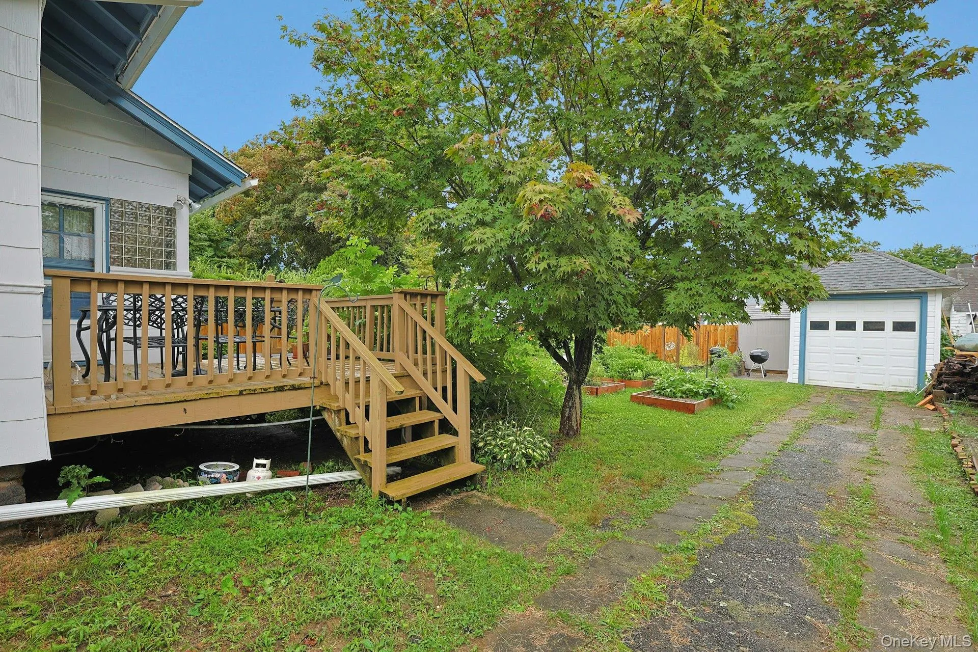 Extended driveway provides easy garage access and extra parking. Extended driveway provides easy garage access and extra parking.