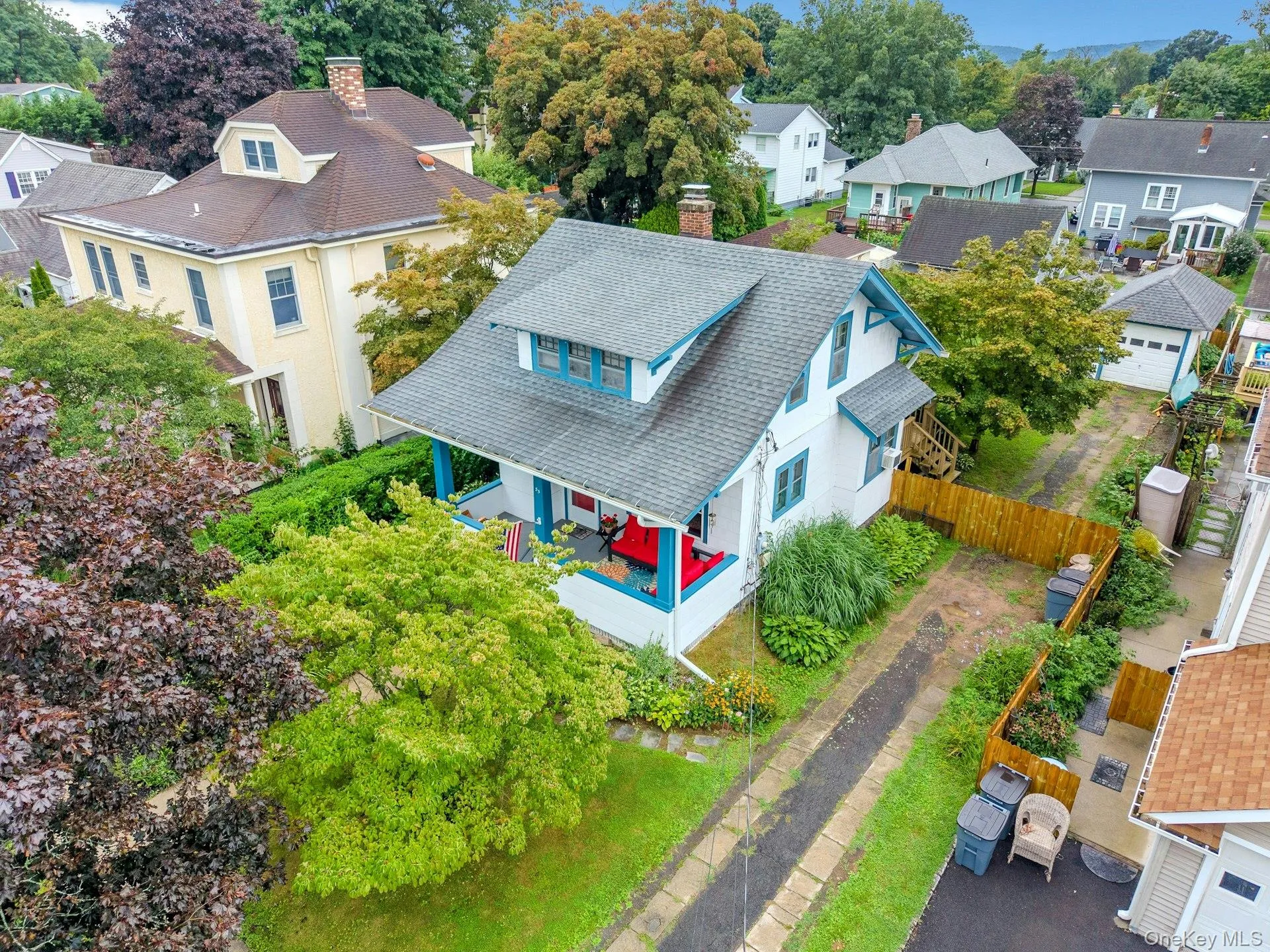 Extended driveway provides convenient access to the one-car garage and ample parking. Extended driveway provides convenient access to the one-car garage and ample parking.