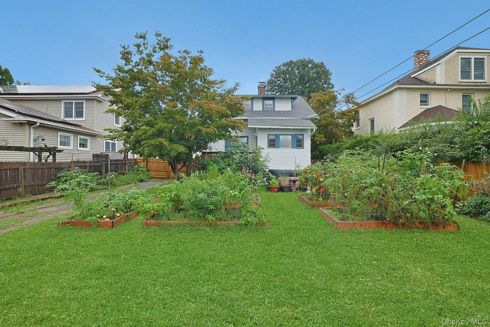Enjoy the comfort of a fully fenced property, creating a welcoming outdoor space for relaxing, gardening, entertaining, and play. Enjoy the comfort of a fully fenced property, creating a welcoming outdoor space for relaxing, gardening, entertaining, and play.
