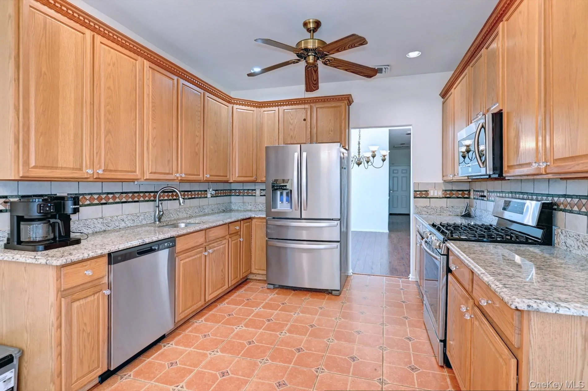 Eat in kitchen with natural stone floor Eat in kitchen with natural stone floor