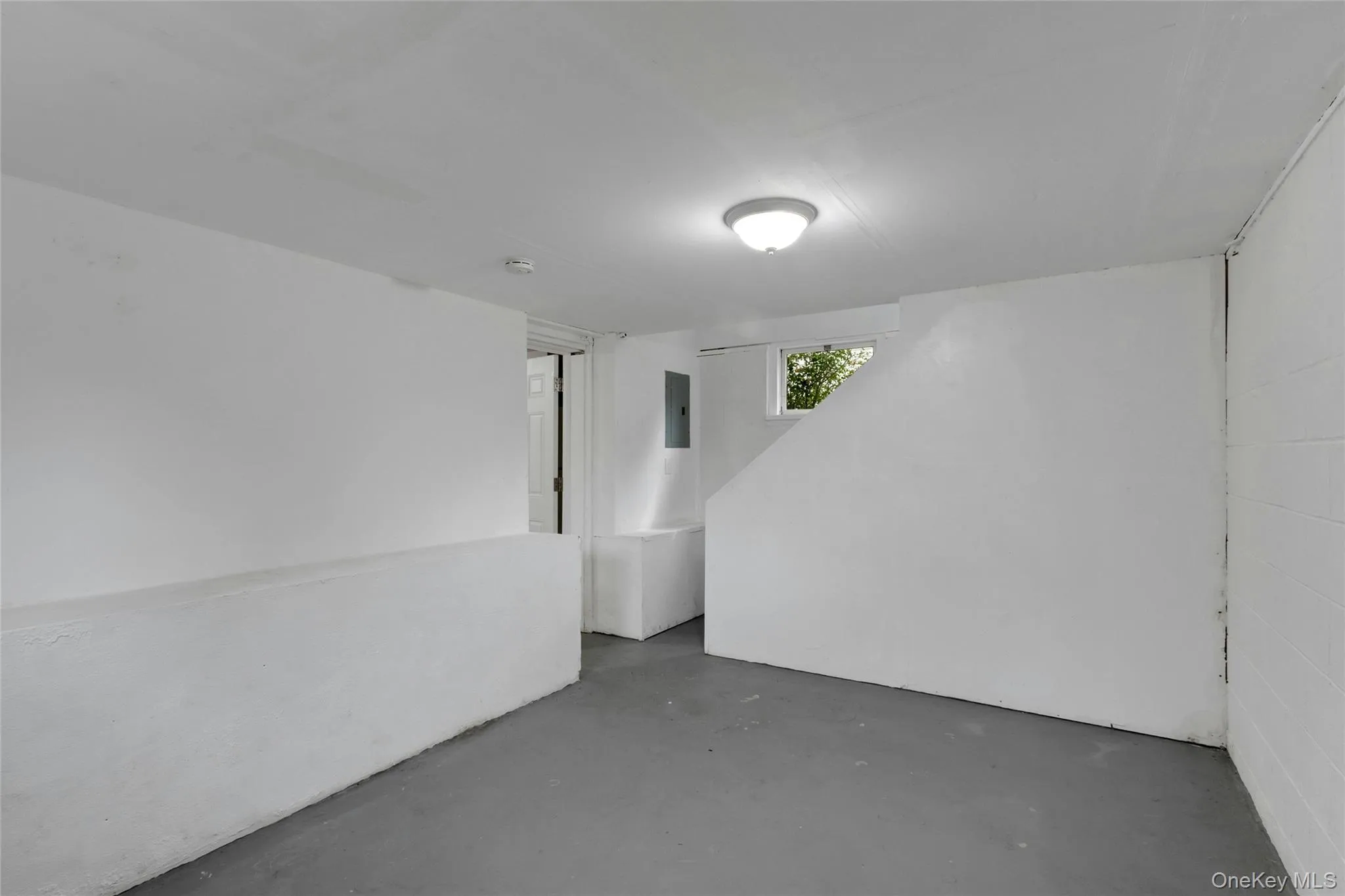 Lower-level unfinished storage area. Lower-level unfinished storage area.