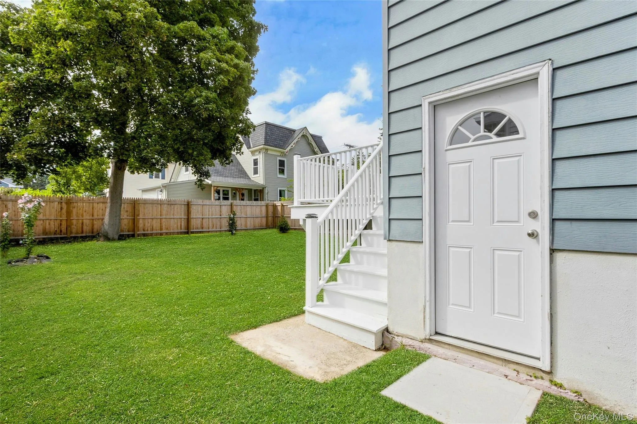 Separate entrance to the lower level of the home. Separate entrance to the lower level of the home.