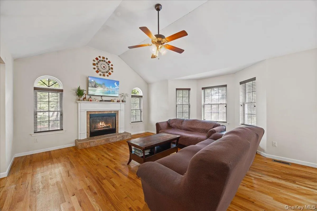 Vaulted ceilings, hardwood floors and cozy fireplace. Vaulted ceilings, hardwood floors and cozy fireplace.