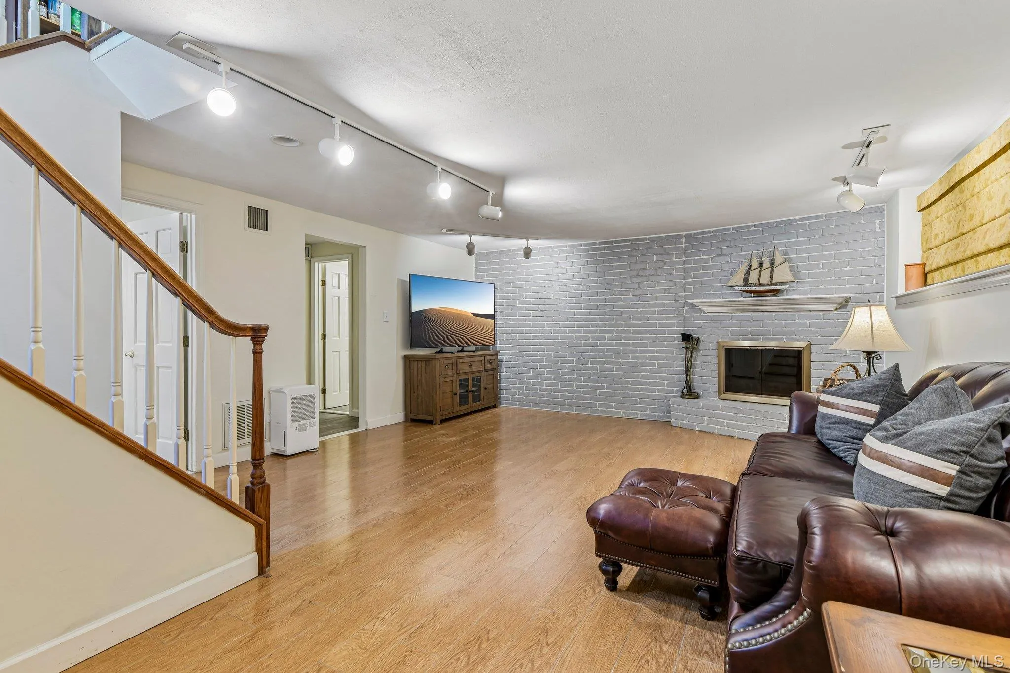 Recreation room w/wood burning fireplace Recreation room w/wood burning fireplace