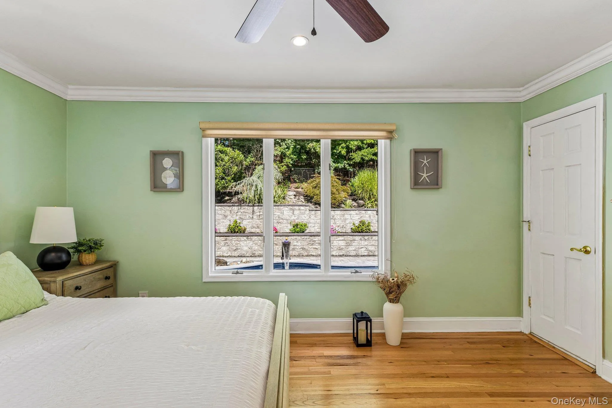 Primary bedroom pool view Primary bedroom pool view