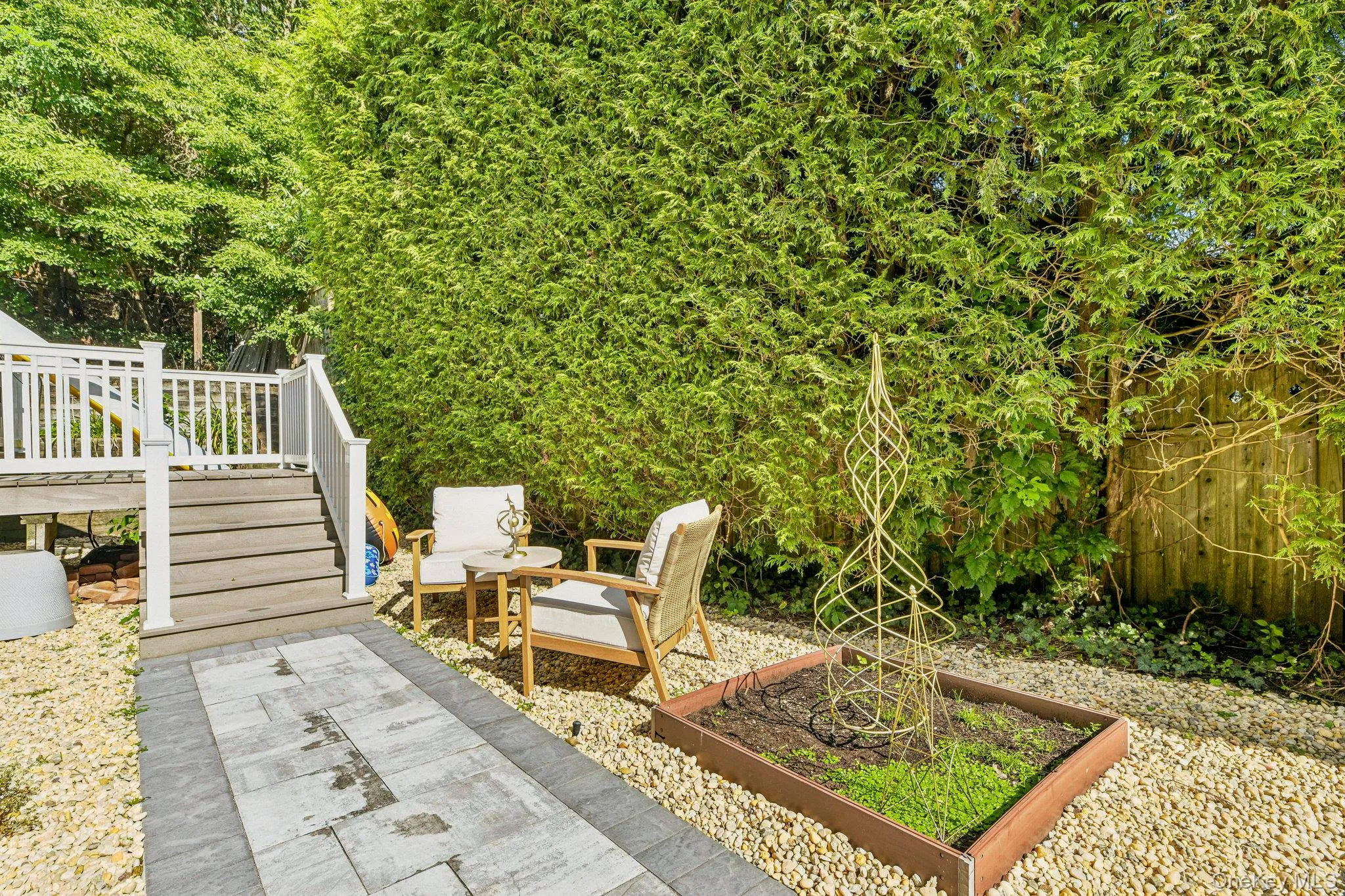 Off the side door- adorable seating area for coffee/wine to start or end your day! Off the side door- adorable seating area for coffee/wine to start or end your day!