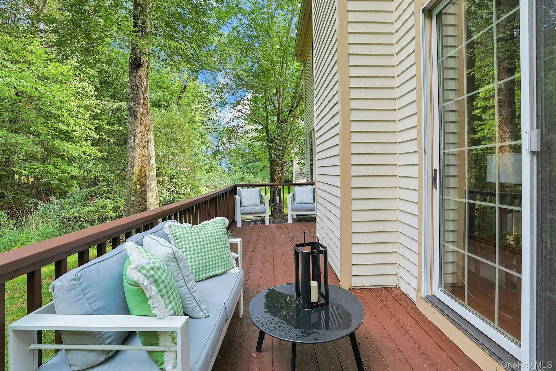 Private deck offers an inviting spot to relax outdoors while enjoying the peaceful, wooded surroundings. Private deck offers an inviting spot to relax outdoors while enjoying the peaceful, wooded surroundings.