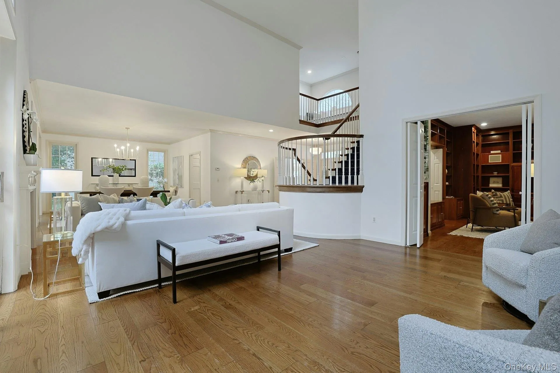 A wider perspective highlights the impressive scale and open flow of the main living spaces, with the private office just beyond. A wider perspective highlights the impressive scale and open flow of the main living spaces, with the private office just beyond.