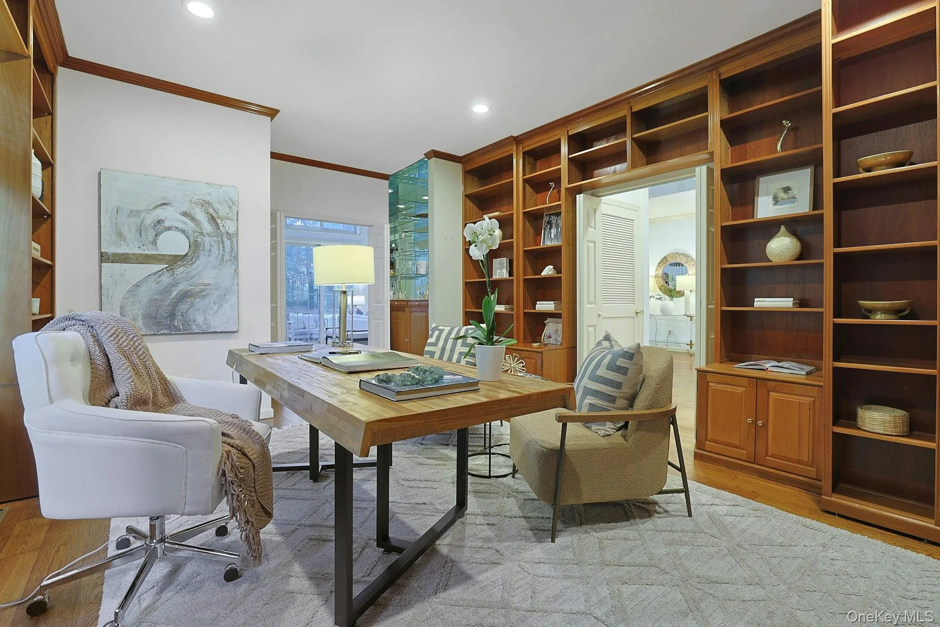 Another view of this substantial room highlights the extensive millwork and flexible layout—equally well suited as an office, library, den or family room. Another view of this substantial room highlights the extensive millwork and flexible layout—equally well suited as an office, library, den or family room.