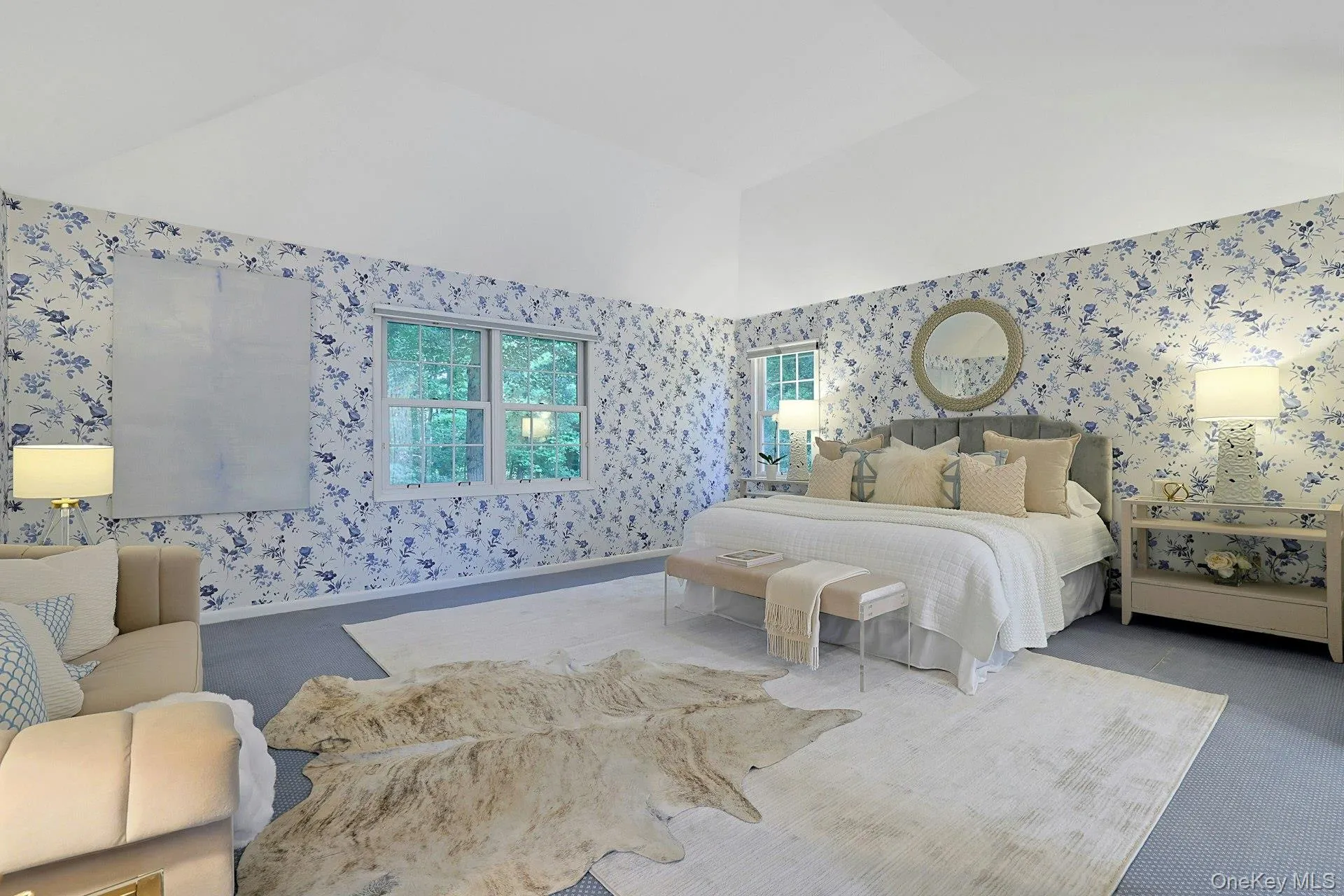 Generously proportioned primary bedroom offers a serene retreat with ample room for a full complement of furnishings. Generously proportioned primary bedroom offers a serene retreat with ample room for a full complement of furnishings.