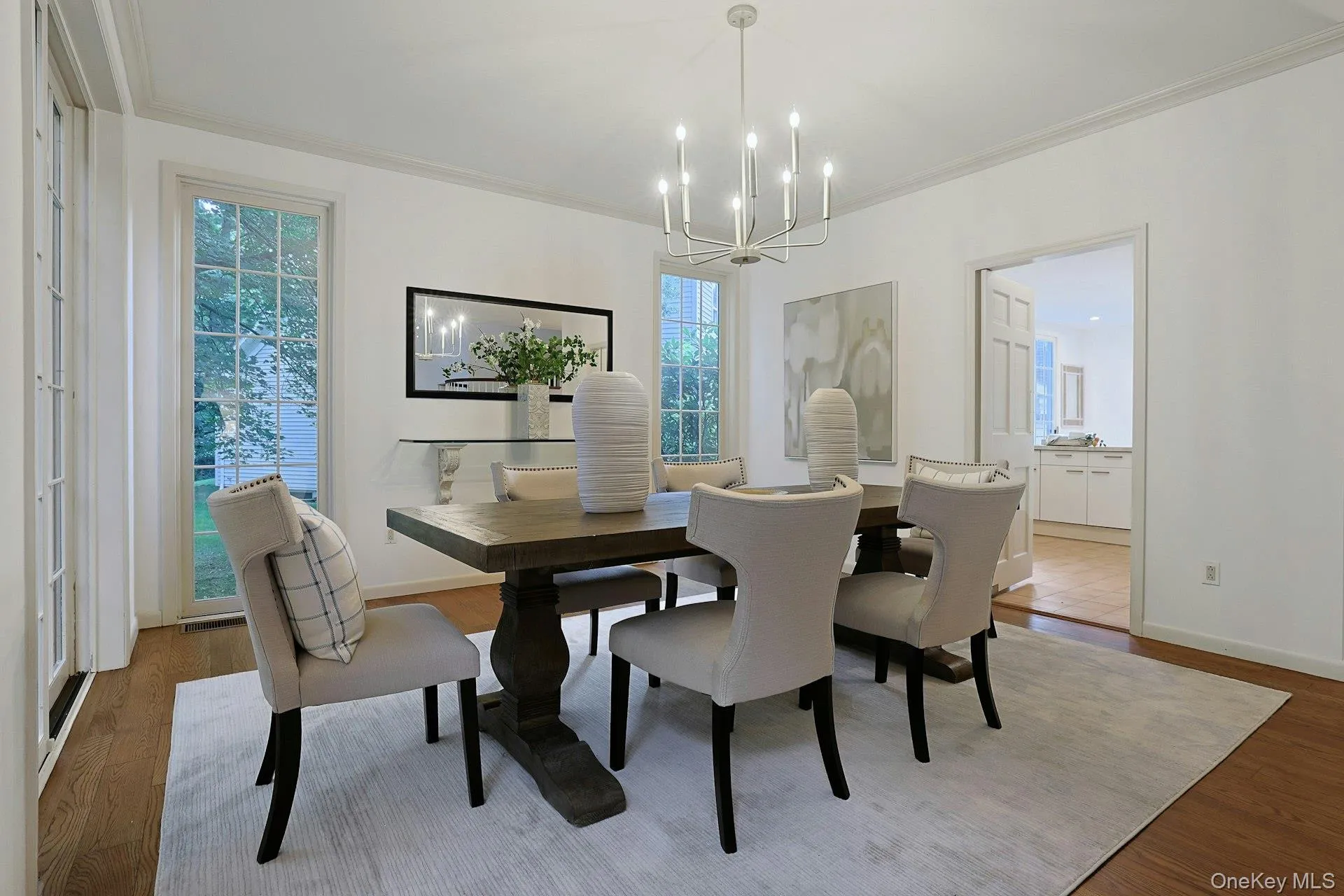 Another perspective of the dining room showcases its generous scale, multiple windows and lovely natural light. Another perspective of the dining room showcases its generous scale, multiple windows and lovely natural light.