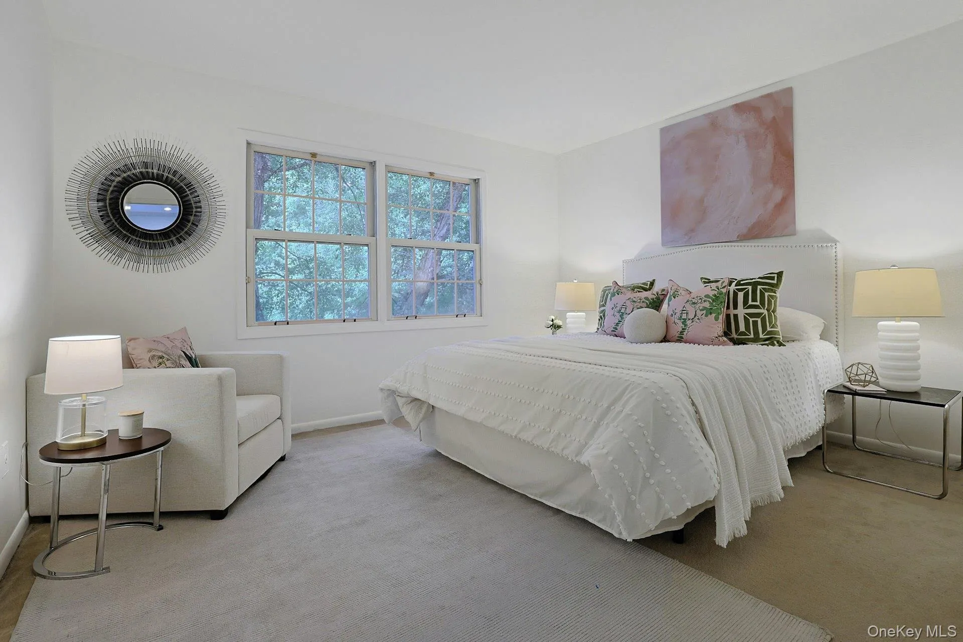 Large, light-filled secondary bedroom with plenty of space for a sitting or study area. Large, light-filled secondary bedroom with plenty of space for a sitting or study area.