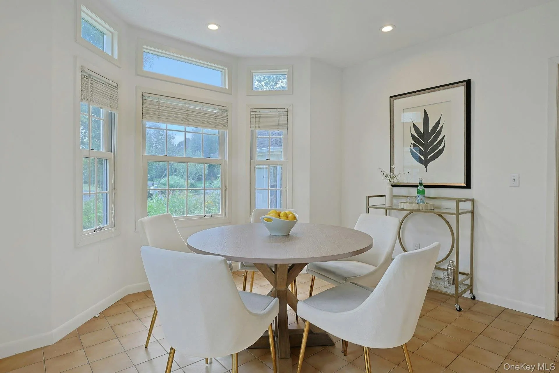 Another view of the bright breakfast area, where multiple exposures bring in wonderful natural light and views of the greenery. Another view of the bright breakfast area, where multiple exposures bring in wonderful natural light and views of the greenery.