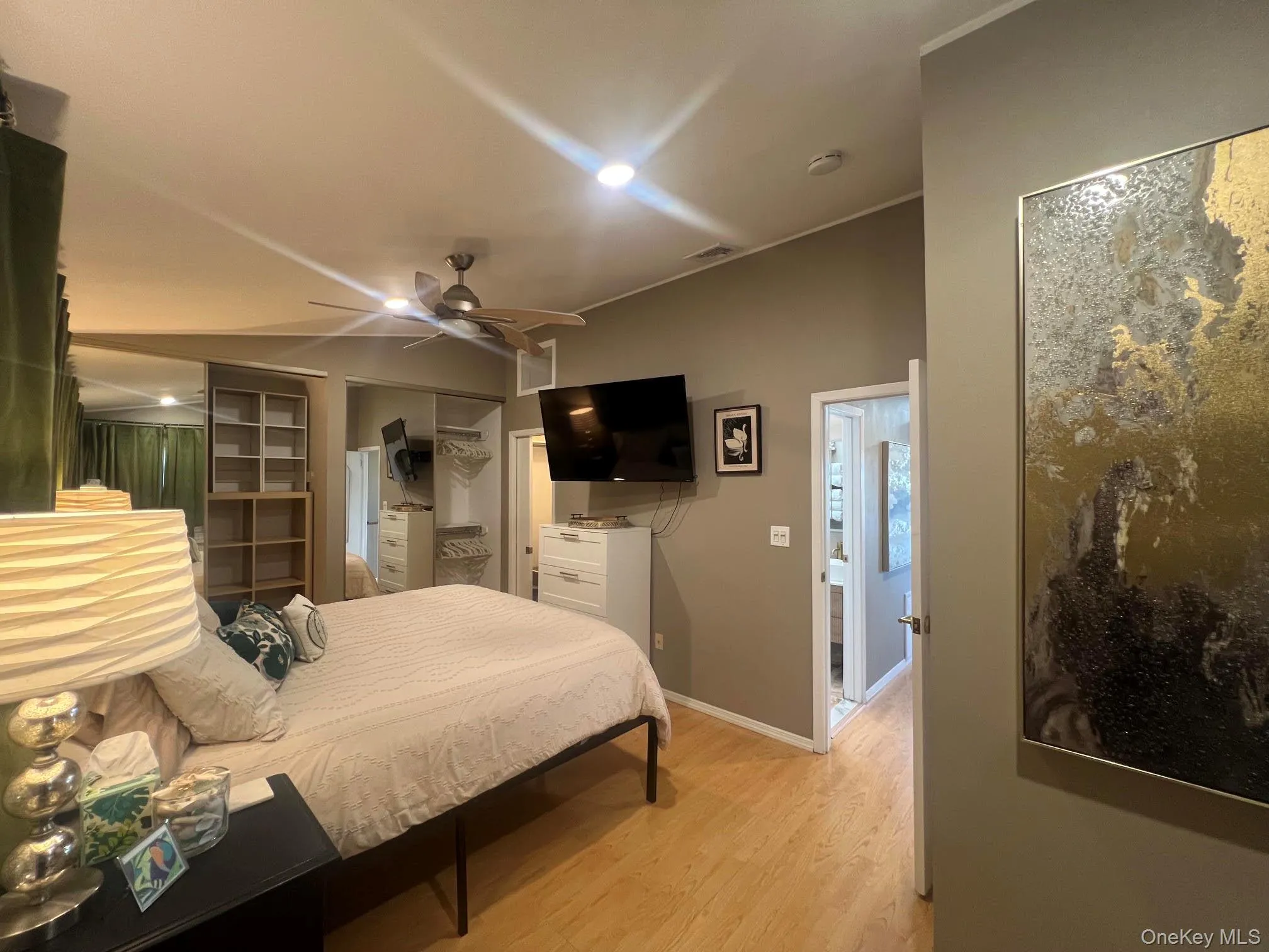 King-Size BR with Full Wall Mirrored Closet AND Walk-in Closet King-Size BR with Full Wall Mirrored Closet AND Walk-in Closet