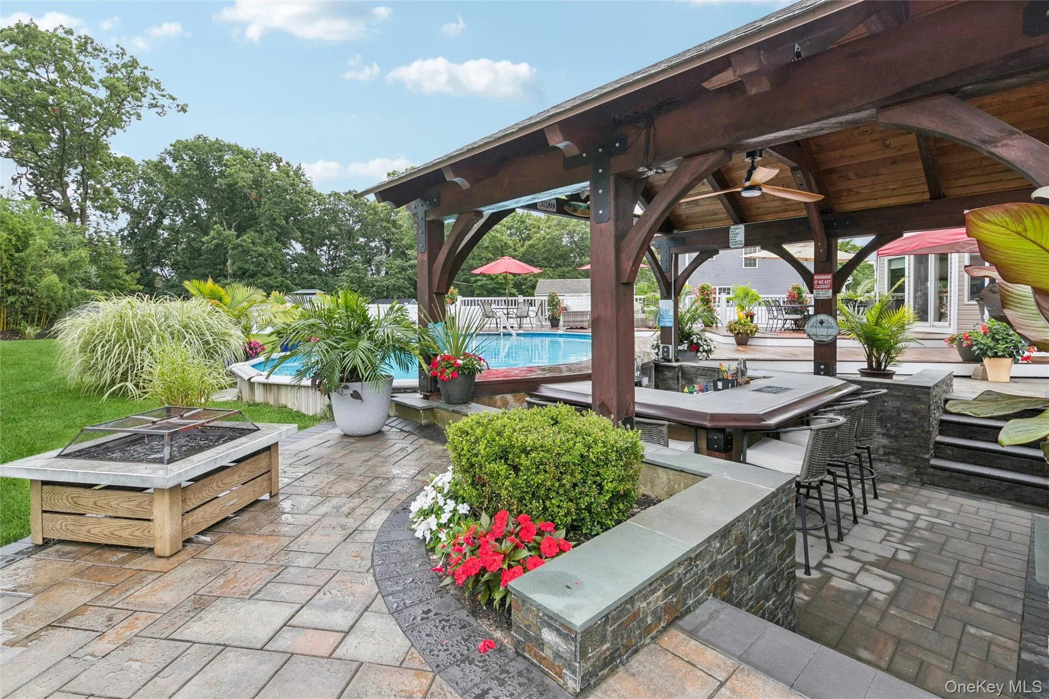Exquisite Paver and Stone Work Embelish the Sunken Area Exquisite Paver and Stone Work Embelish the Sunken Area