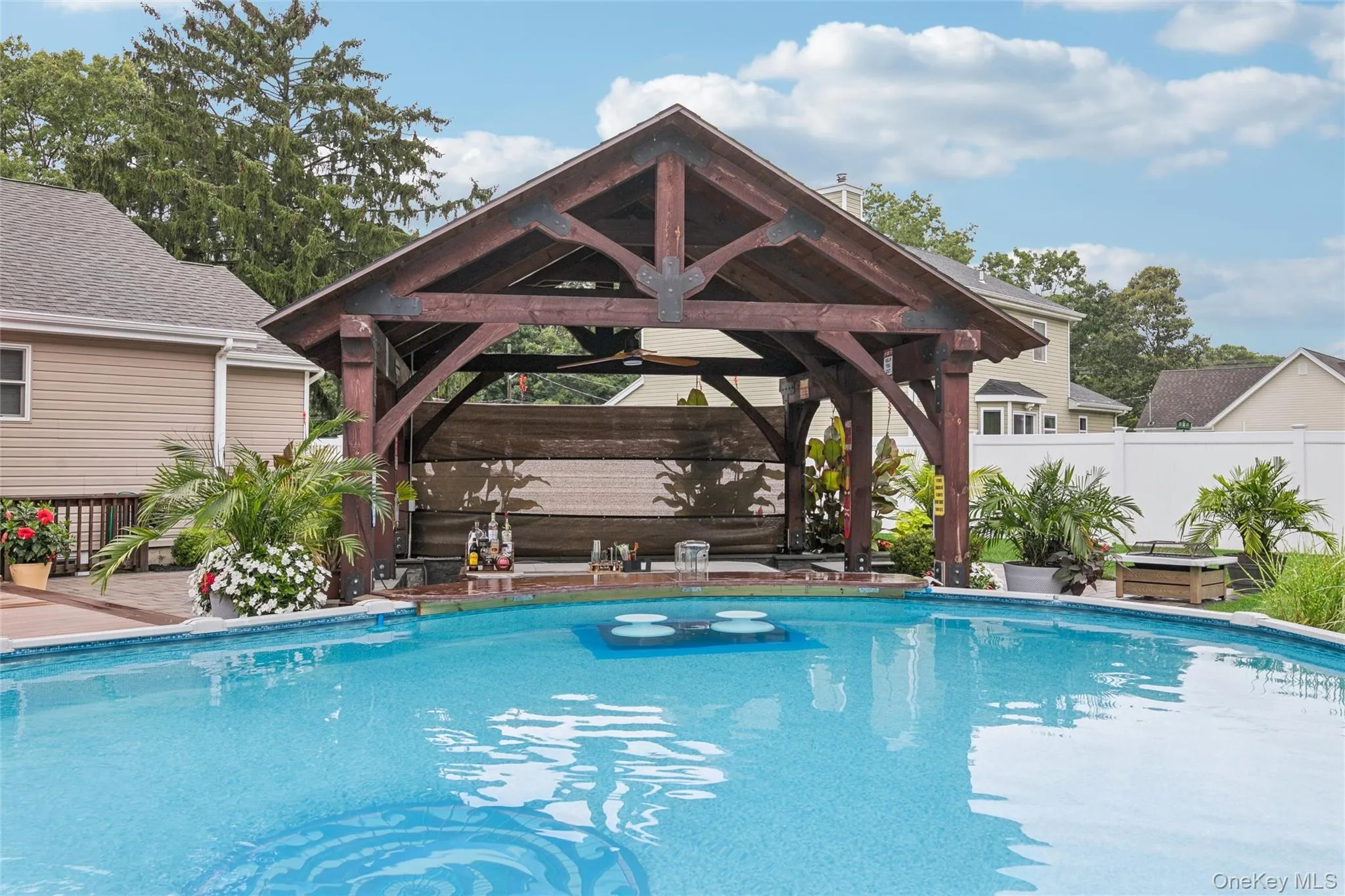 Custom Outdoor 14 x 14 Pavillion Offers a Swim-up Bar Custom Outdoor 14 x 14 Pavillion Offers a Swim-up Bar