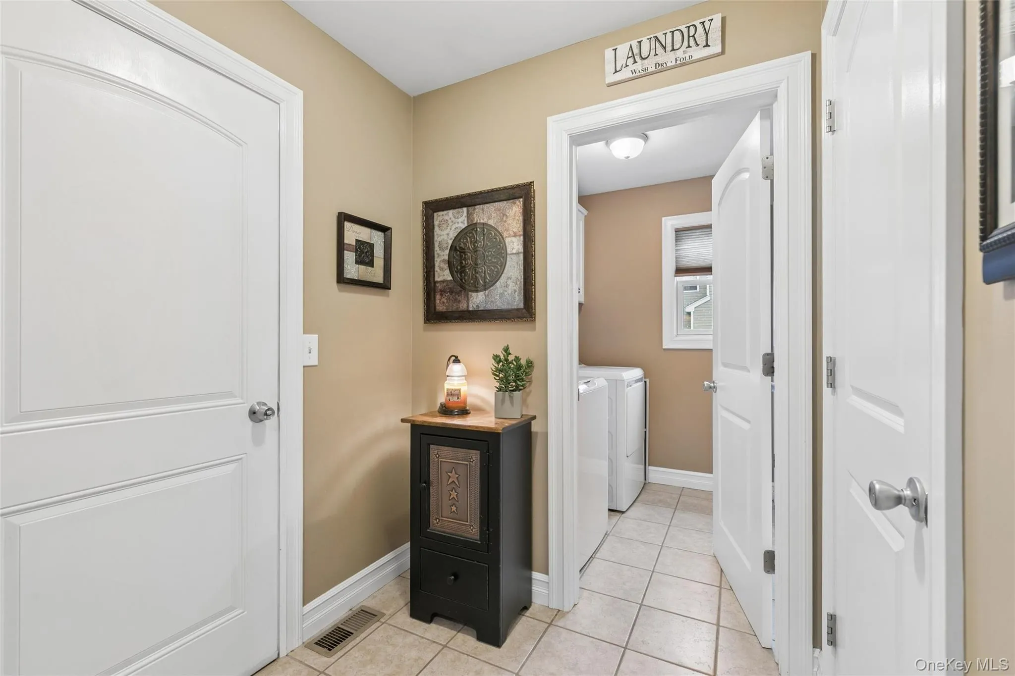 Access From Kitchen to Garage, 1/2 Bath, Laundry and Large Step-in Pantry Access From Kitchen to Garage, 1/2 Bath, Laundry and Large Step-in Pantry