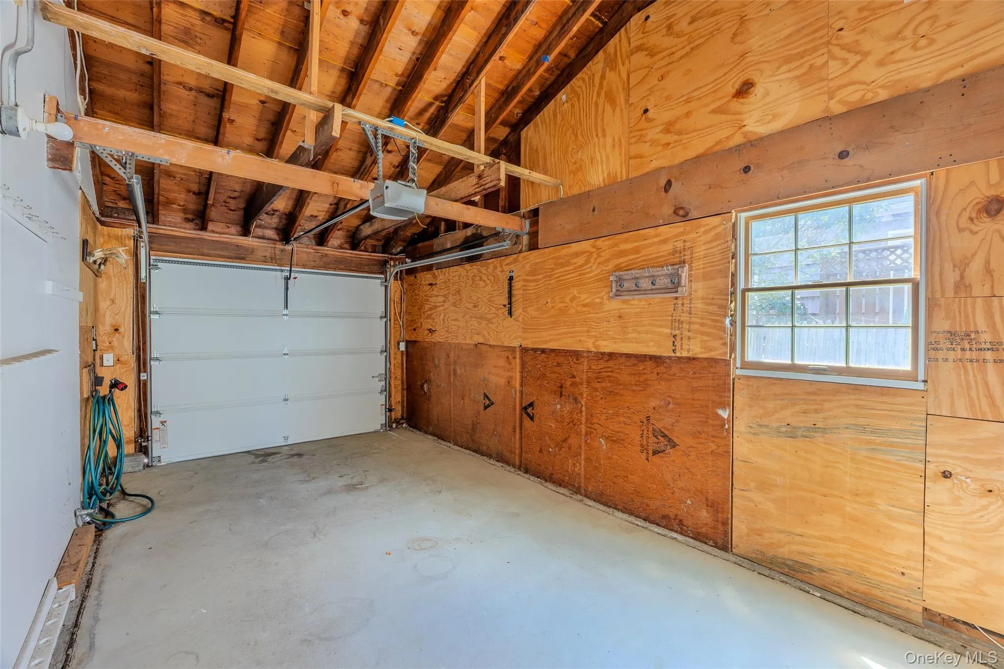 1 car garage attached to house located off the family room by kitchen too 1 car garage attached to house located off the family room by kitchen too