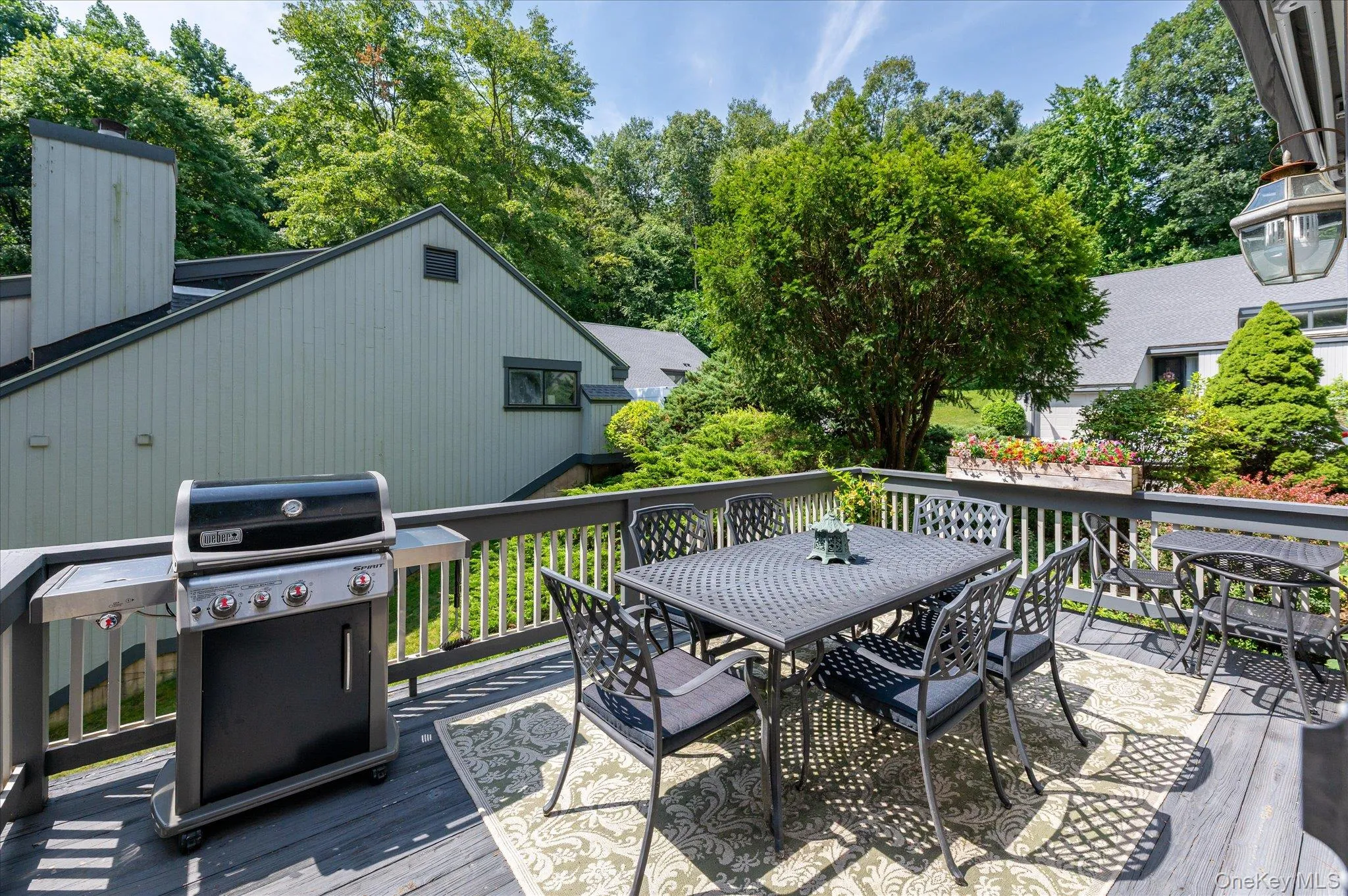 Deck off living room with awning retracted Deck off living room with awning retracted