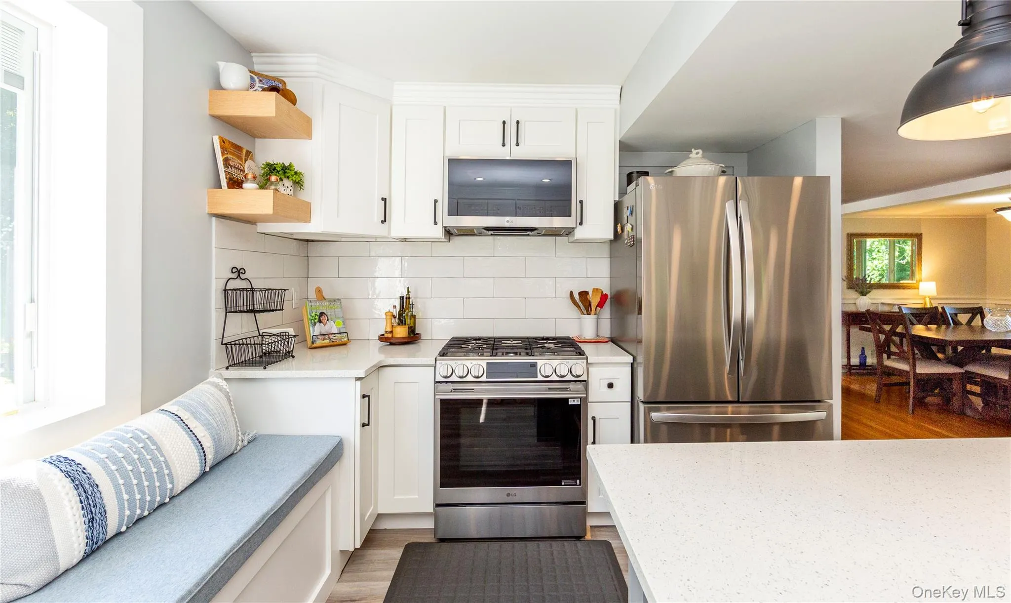 Stainless steel gas range, refrigerator, dishwasher and microwave. Stainless steel gas range, refrigerator, dishwasher and microwave.