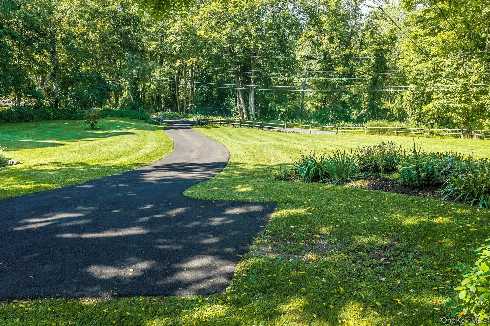 Paved driveway is easy to maintain. Paved driveway is easy to maintain.
