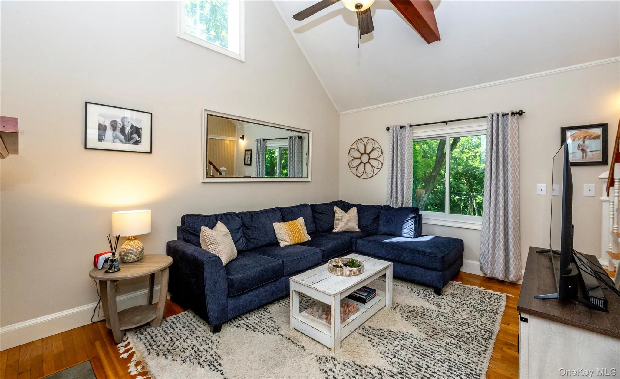 Large picture window frames the outdoor landscaping. Large picture window frames the outdoor landscaping.