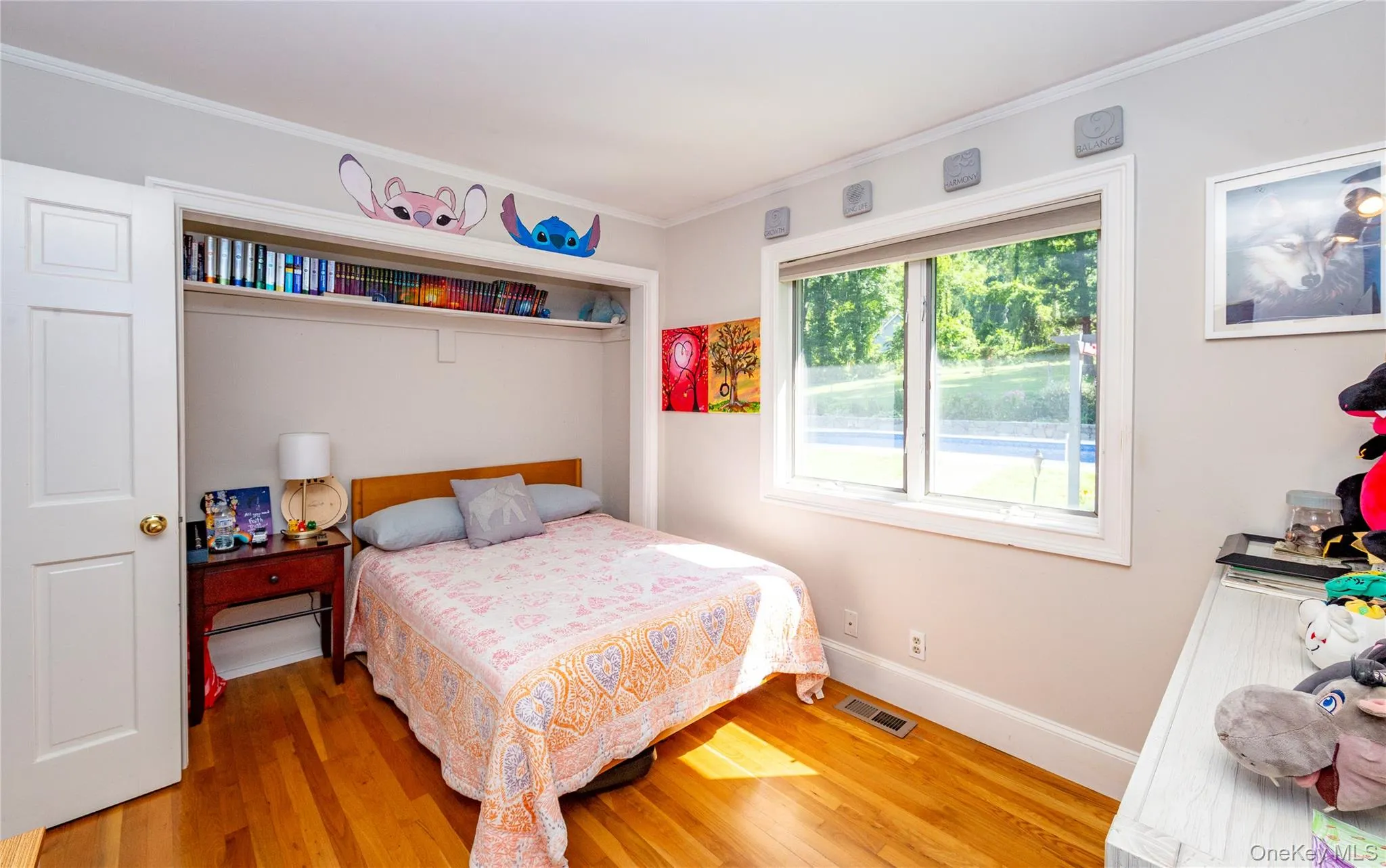 Another hallway leads to two bedrooms, including a comfortable second bedroom. Another hallway leads to two bedrooms, including a comfortable second bedroom.