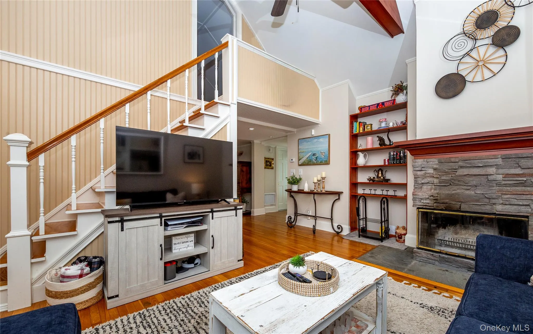 From the living room, steps lead to a private third bedroom. From the living room, steps lead to a private third bedroom.