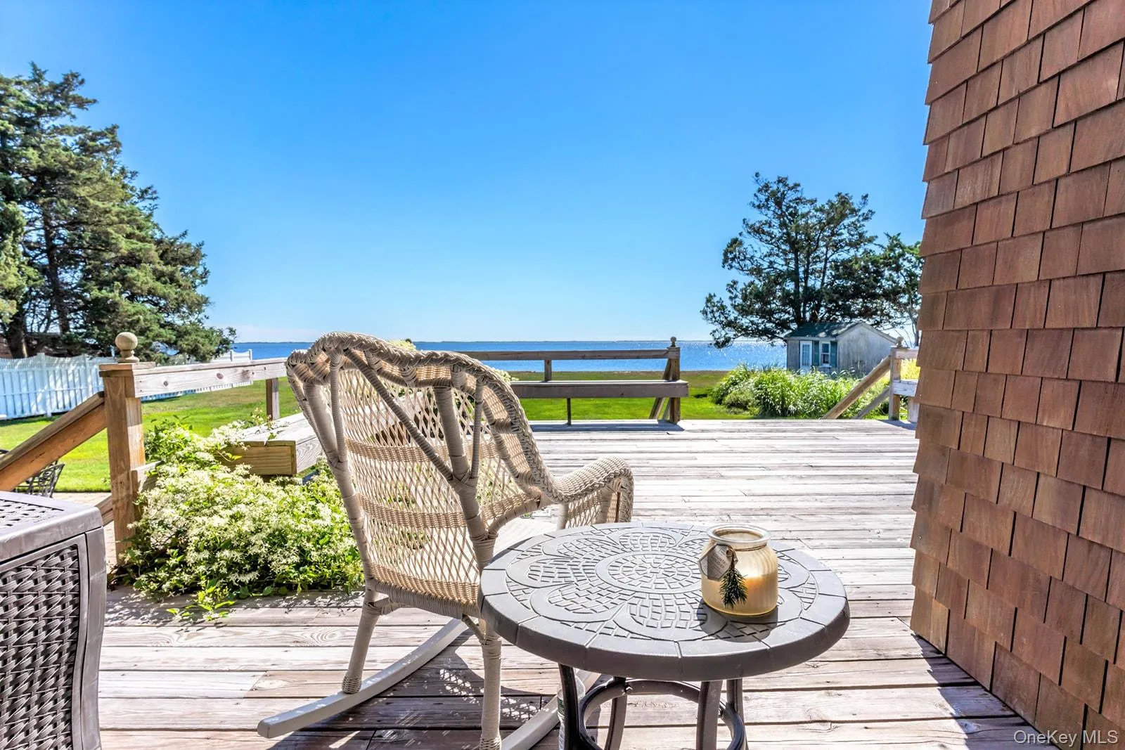 Deck with central AC unit and a water view Deck with central AC unit and a water view