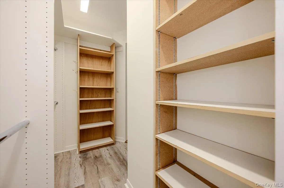 Primary walk in closet Primary walk in closet