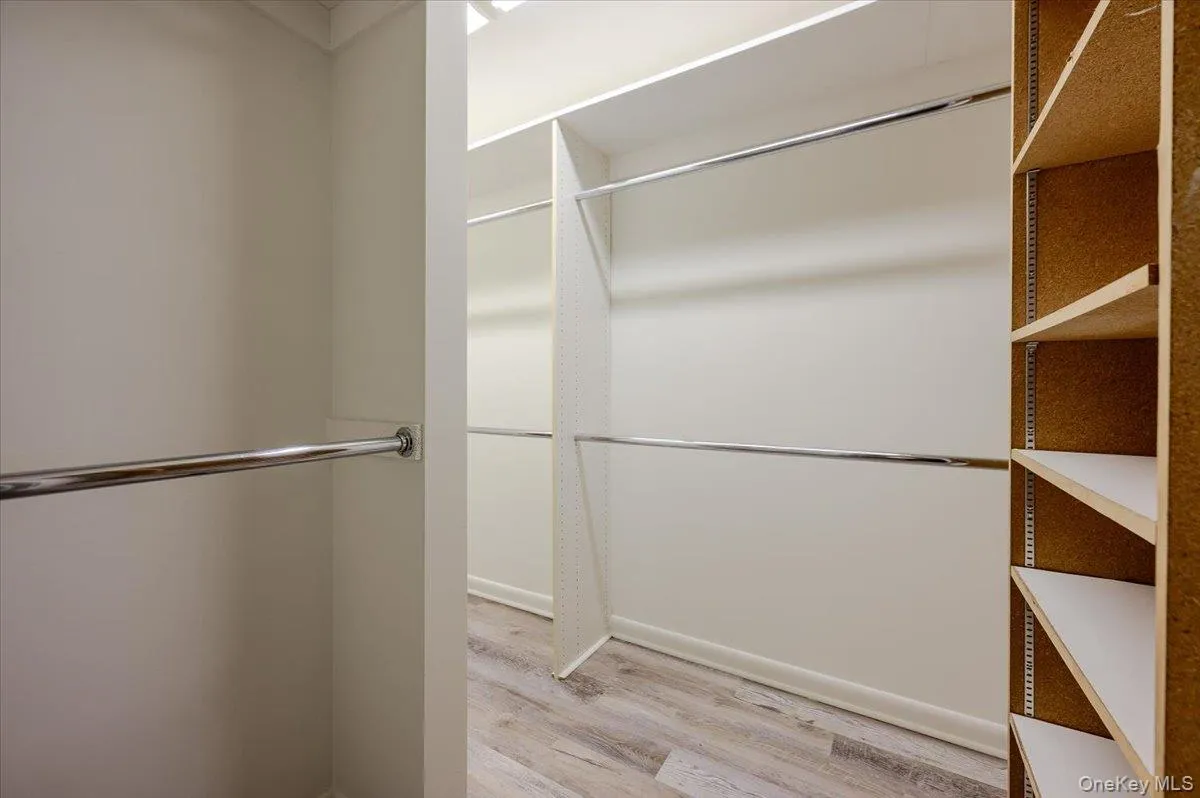 Primary walk in closet Primary walk in closet