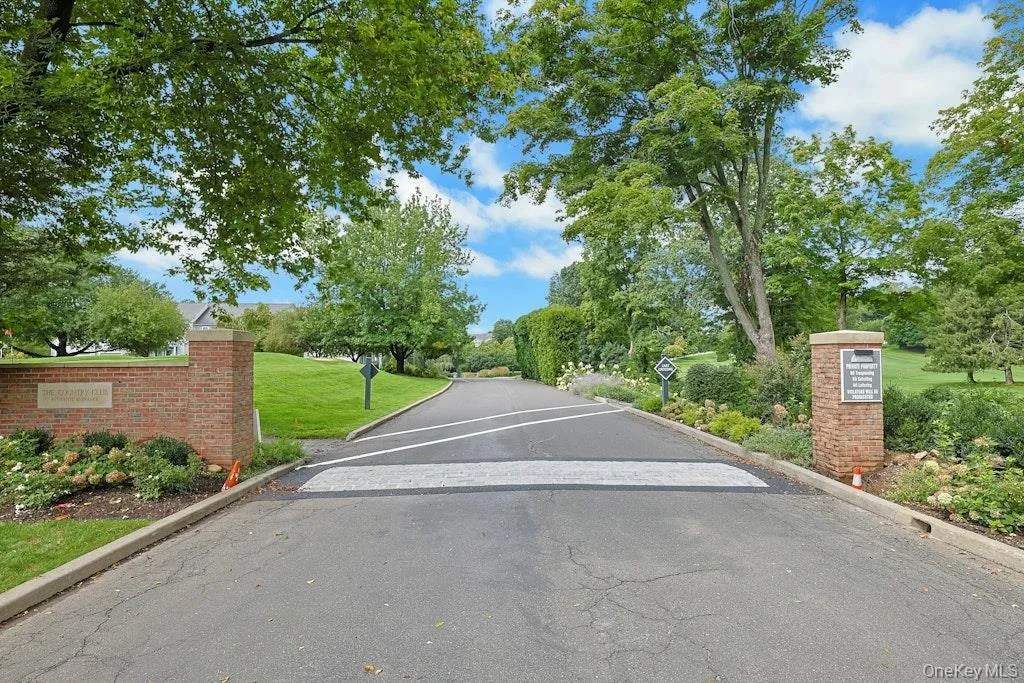 Stone pillar entryway to the Pleasantville Country Club community Stone pillar entryway to the Pleasantville Country Club community