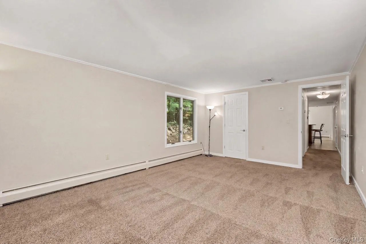 Large primary bedroom with parimary bathroom and large walk in closet. Large primary bedroom with parimary bathroom and large walk in closet.