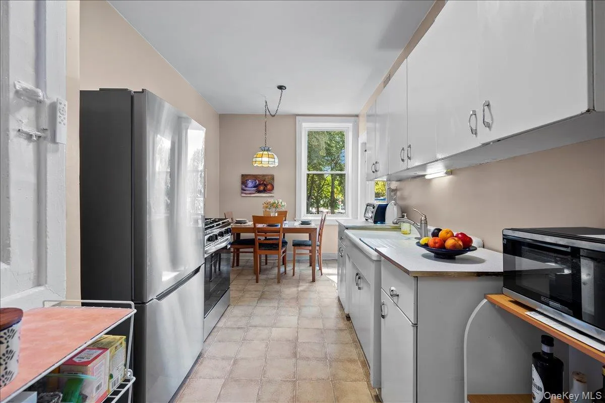 Kitchen has great flow with entrances at each end Kitchen has great flow with entrances at each end