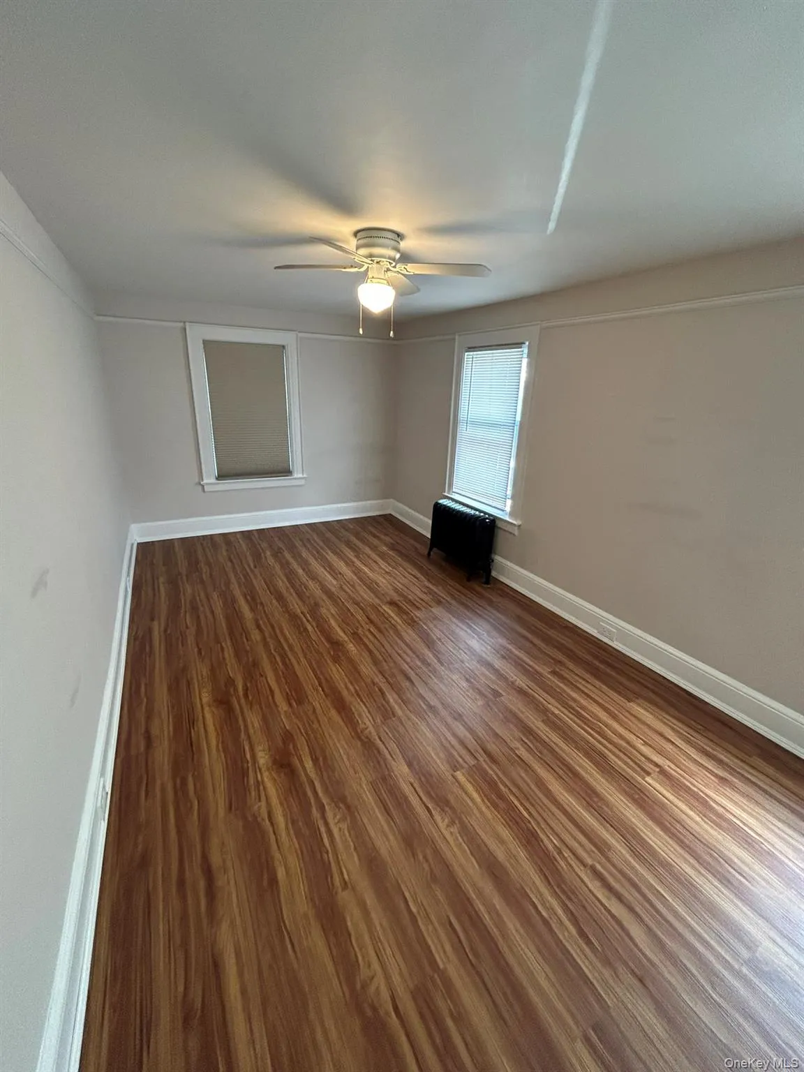 Sunny and Bright Living Room - New Floors/ Freshly Painted Sunny and Bright Living Room - New Floors/ Freshly Painted