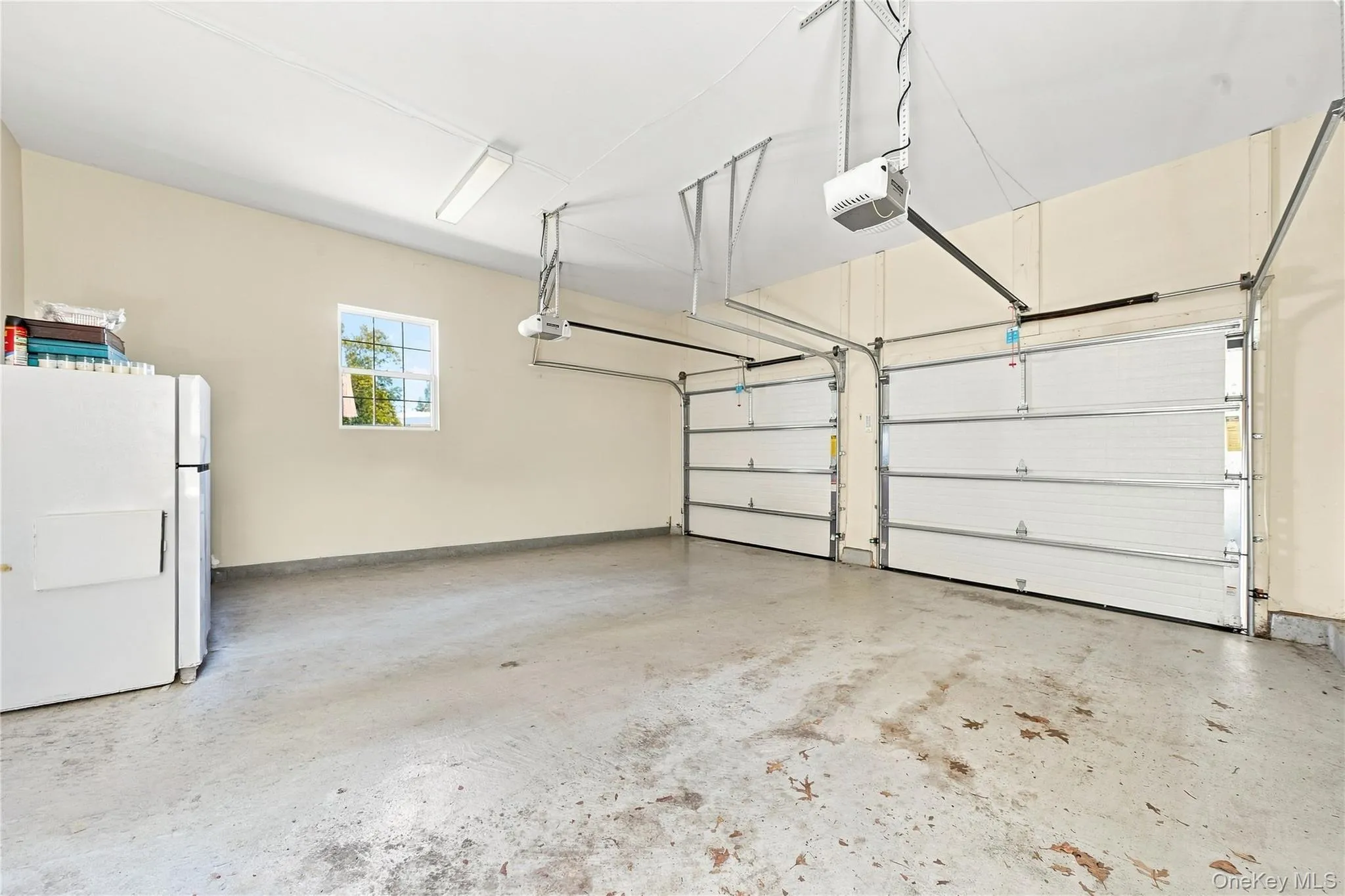 True two car garage with extra fridge/freezer True two car garage with extra fridge/freezer