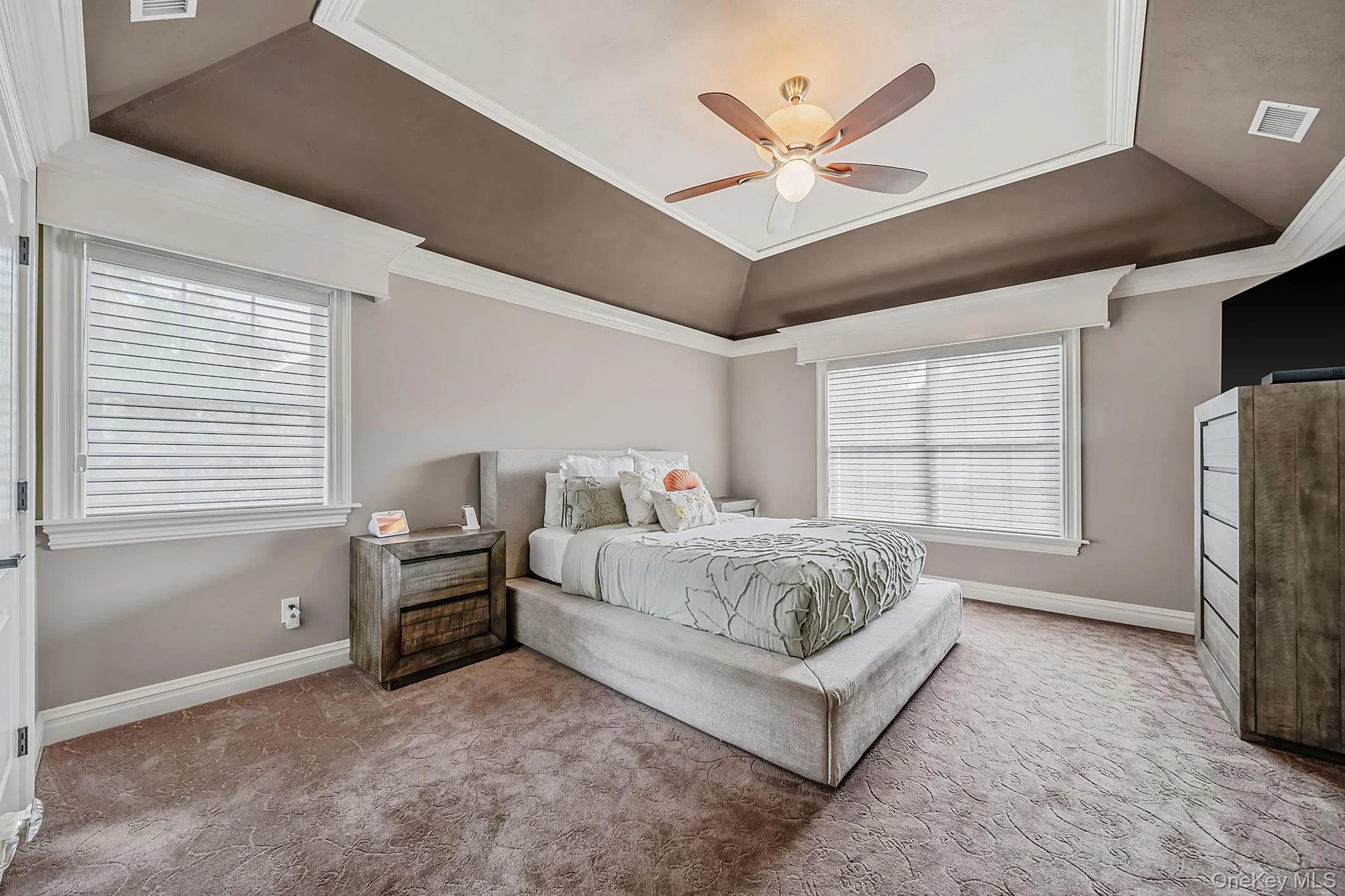 Tray ceiling with crown molding and recessed lighting Tray ceiling with crown molding and recessed lighting