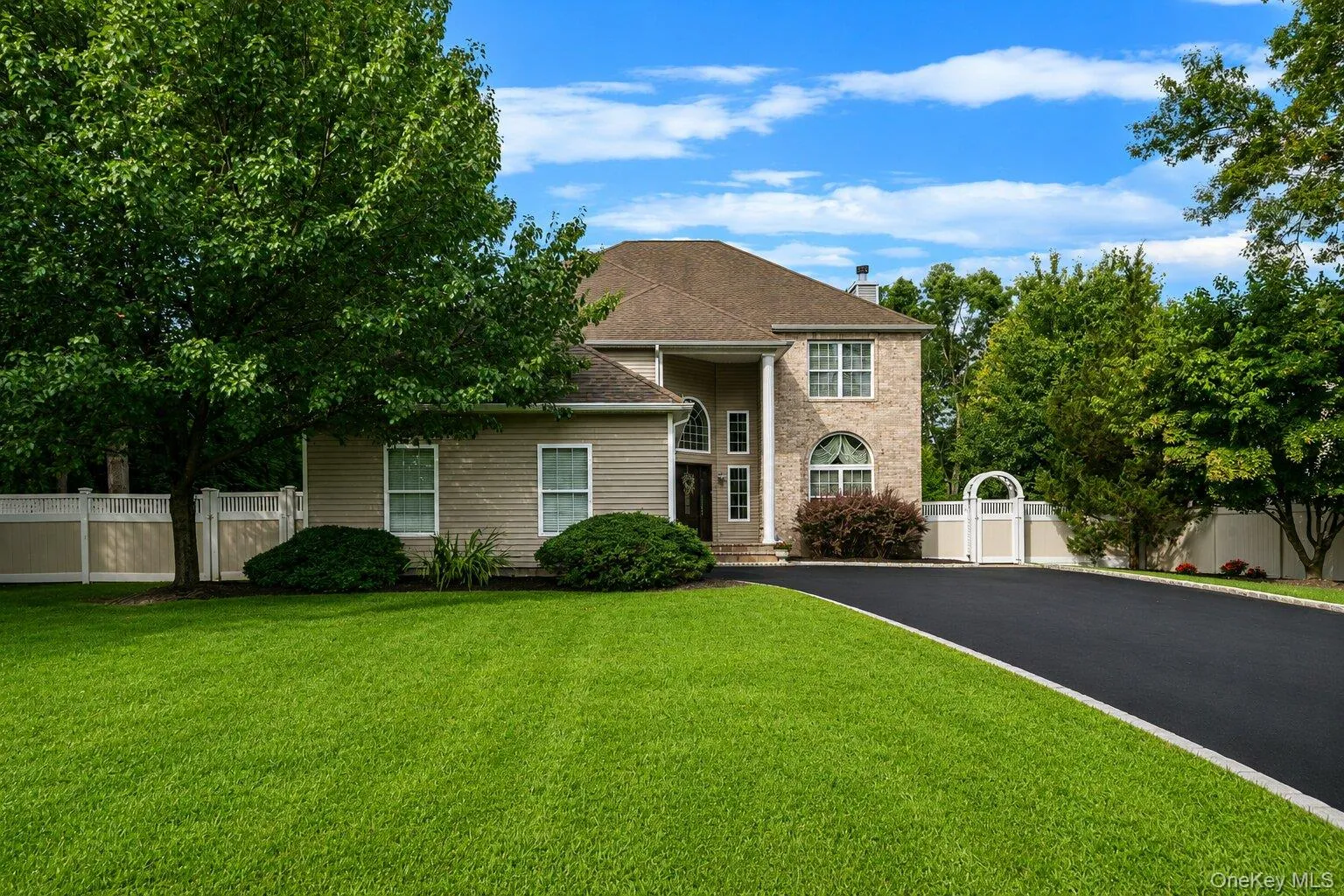 View of the front exterior and lawn. View of the front exterior and lawn.