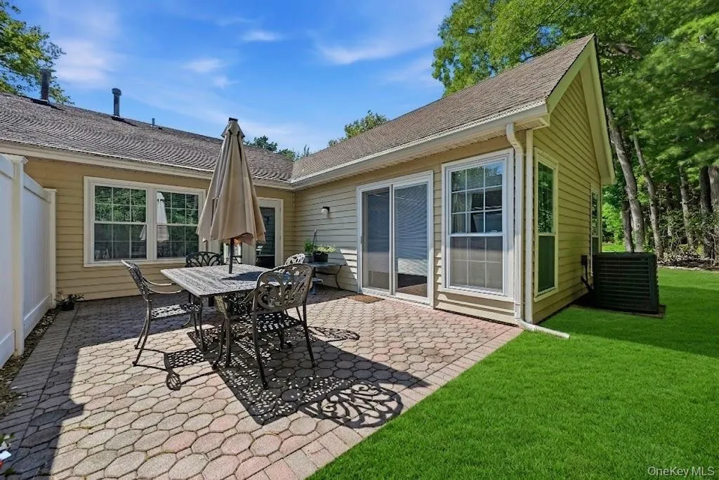 Back Of The Home & The Custom Brick/Paver Patio. Back Of The Home & The Custom Brick/Paver Patio.