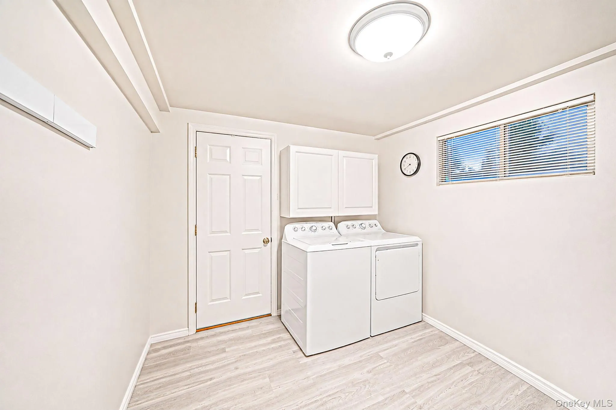 Laundry Room with extra refrigerator Laundry Room with extra refrigerator