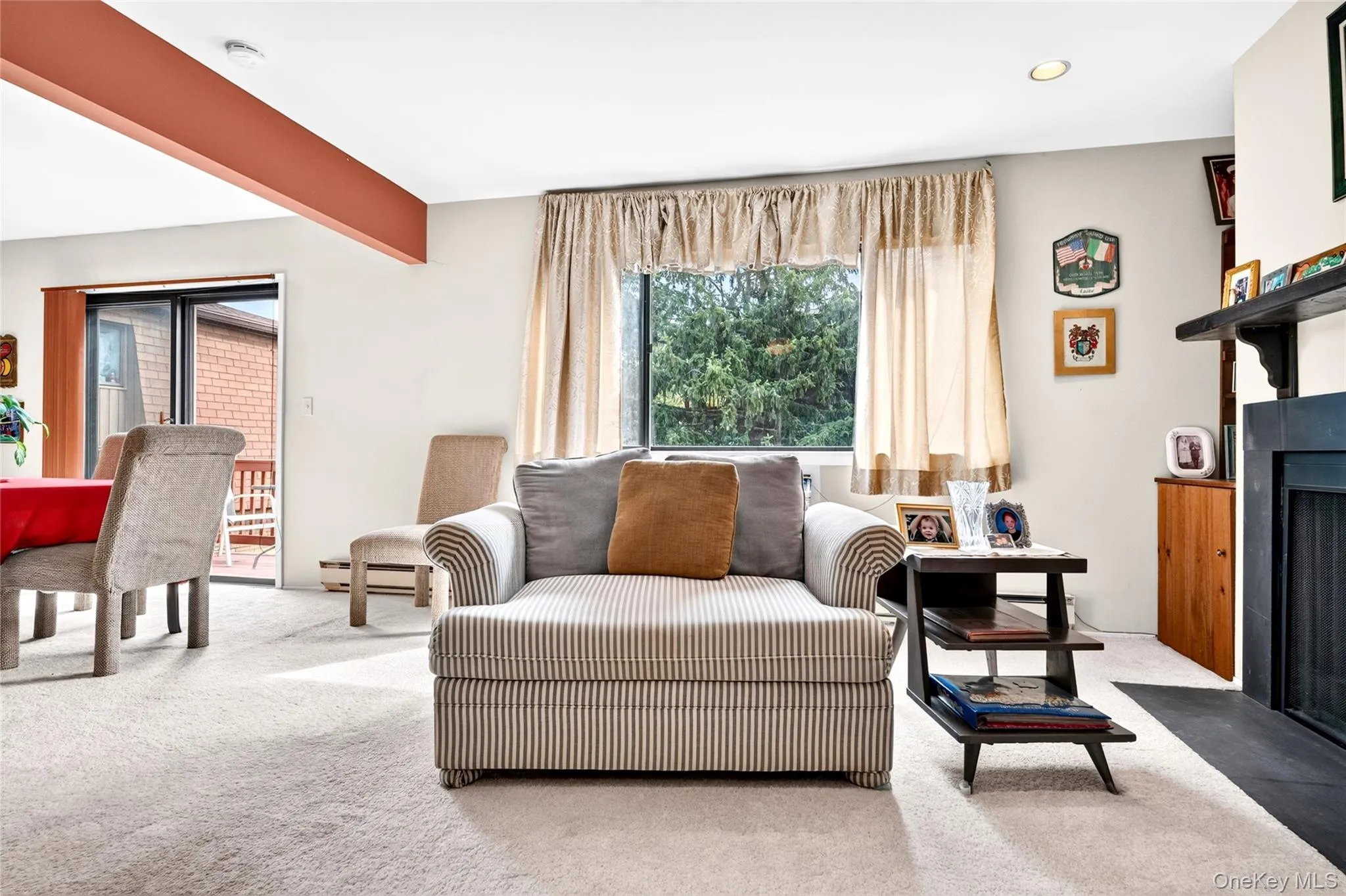 Open living and dining areas with deck access. Open living and dining areas with deck access.