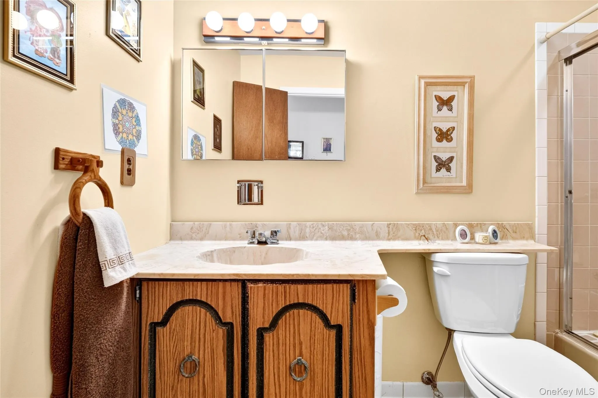 Full bathroom with tub and shower. Full bathroom with tub and shower.
