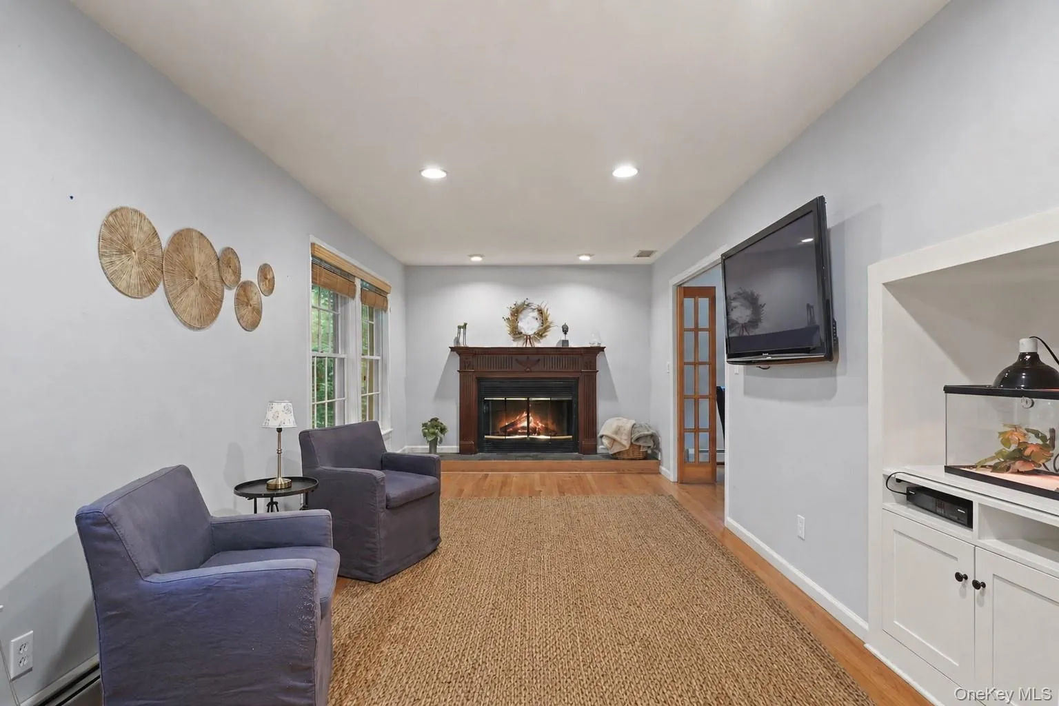 Family room with wood burning fireplace Family room with wood burning fireplace