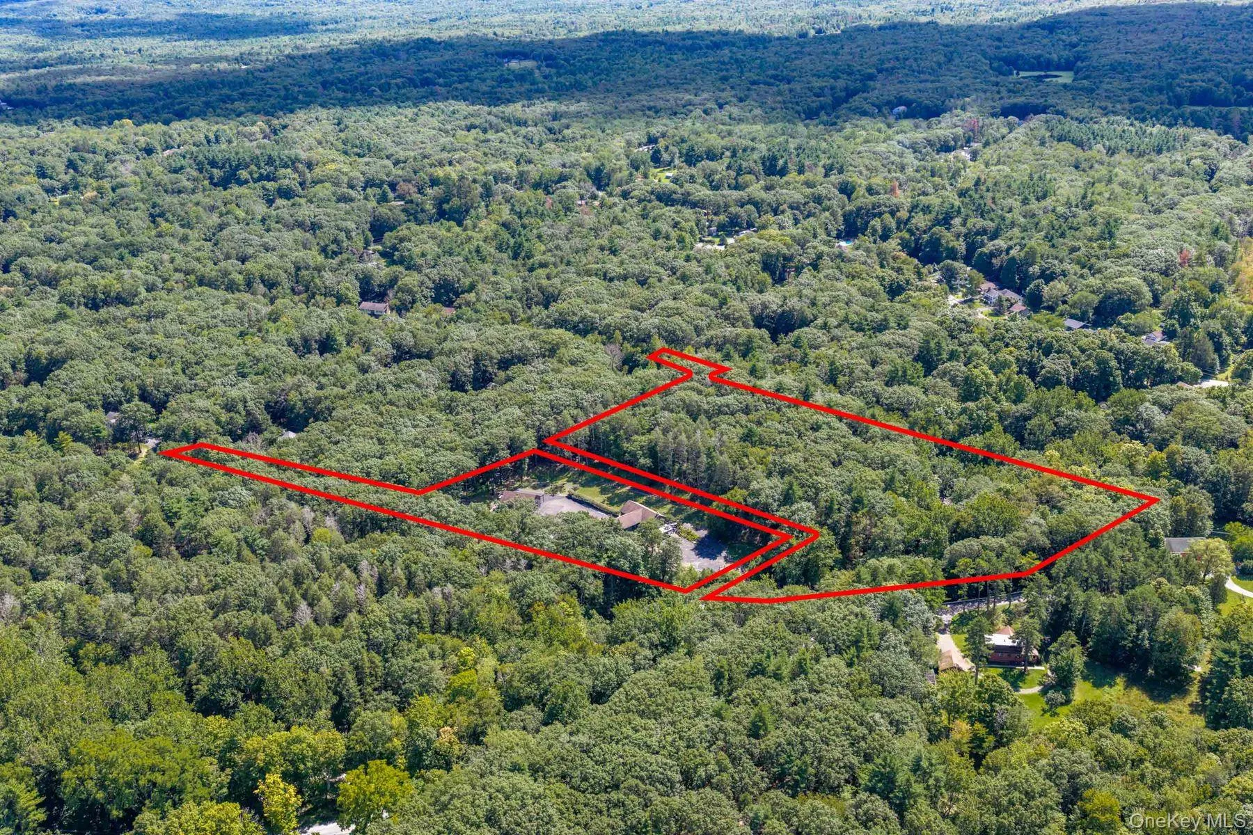 Aerial view showing the boundaries of both parcels included in the sale. Aerial view showing the boundaries of both parcels included in the sale.