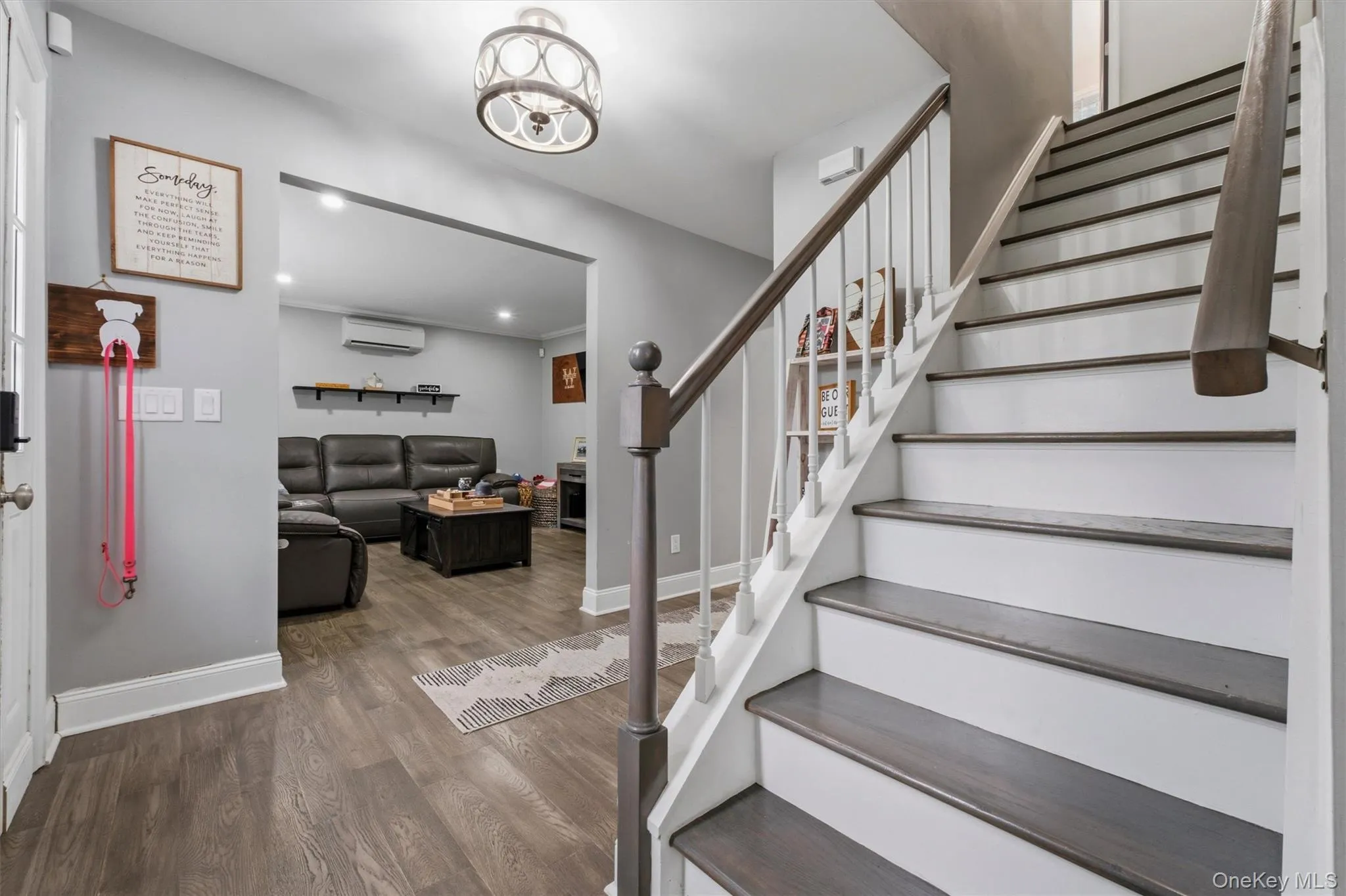 Foyer with Living Room Entry and and Stairs. Foyer with Living Room Entry and and Stairs.