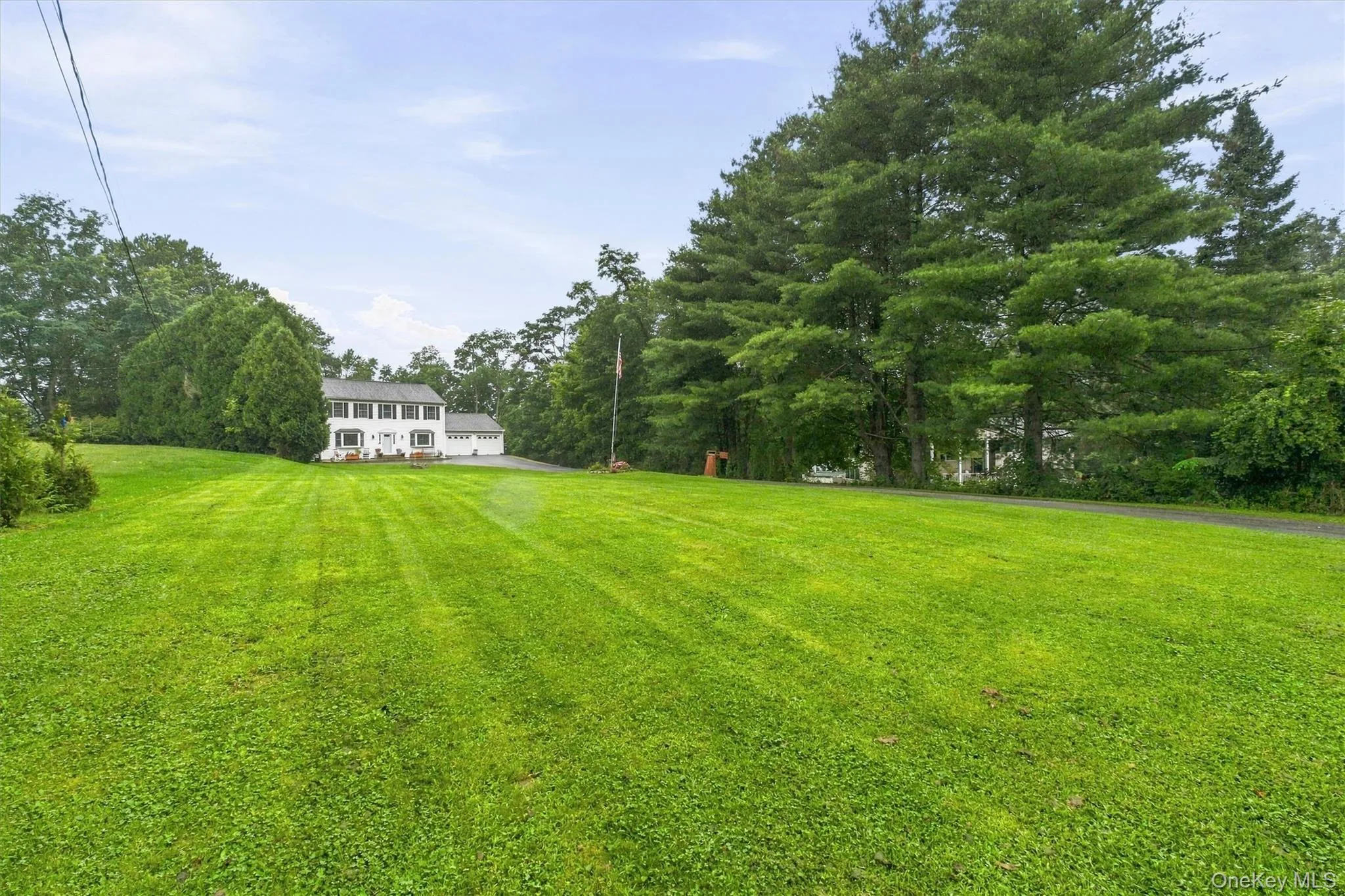 Front with Expansive Lawn. Front with Expansive Lawn.