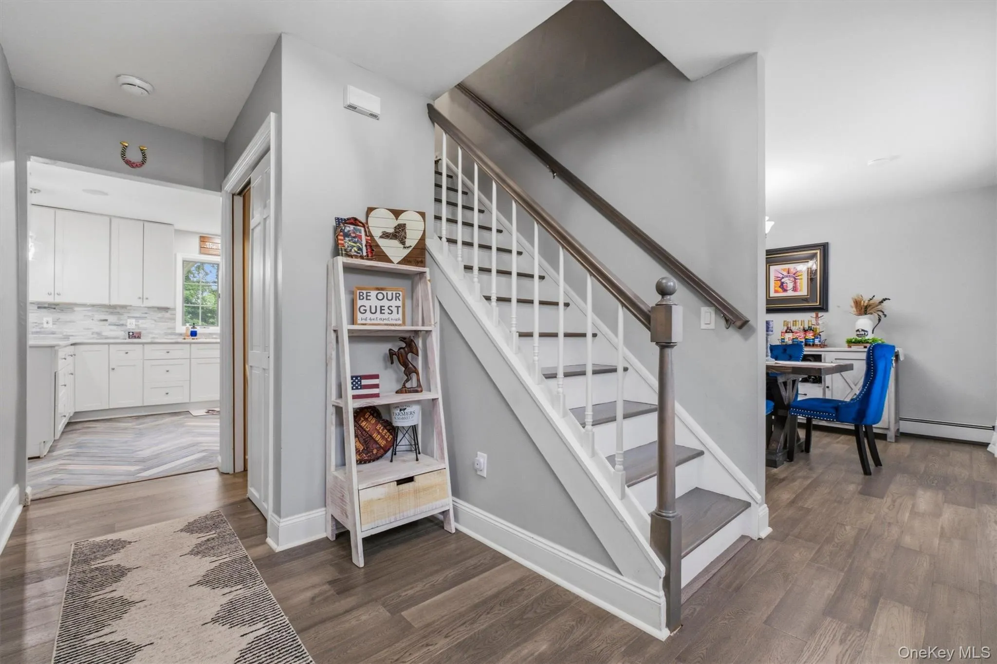 Angle of Entry Showing Dining Room and Kitchen View. Angle of Entry Showing Dining Room and Kitchen View.