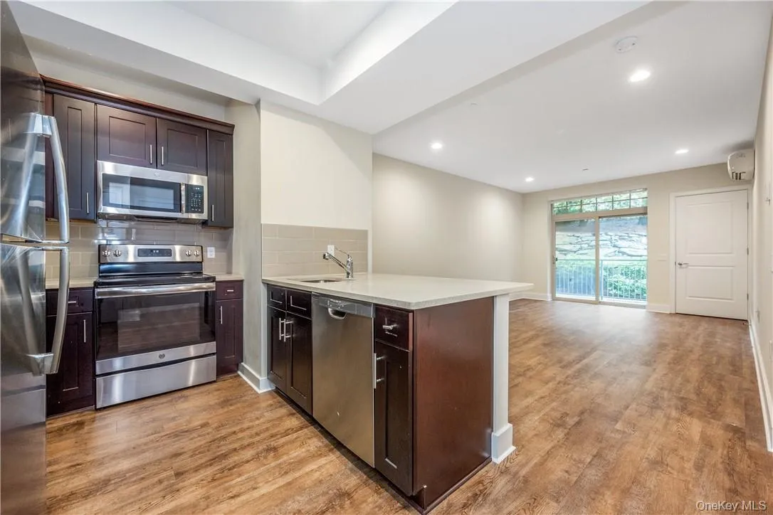 Kitchen w/Quartz Countertops & Island Kitchen w/Quartz Countertops & Island