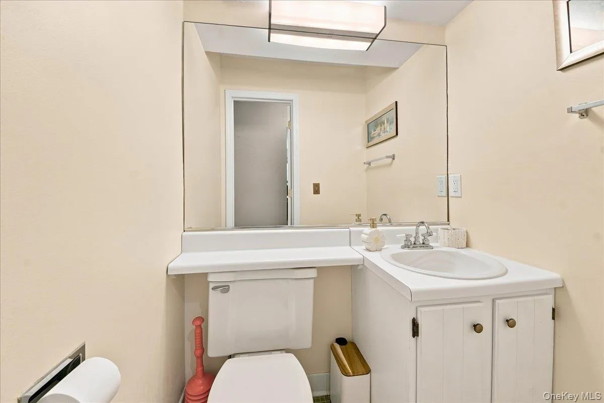 Vanity with integrated sink, chrome faucet, and cabinet storage Vanity with integrated sink, chrome faucet, and cabinet storage
